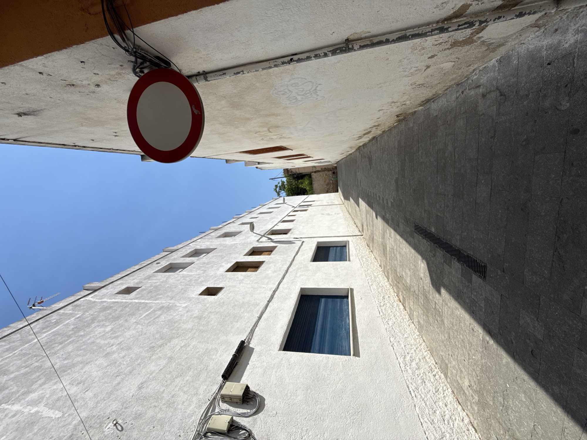 Everyday life moving through Blanes old town on a sunny morning