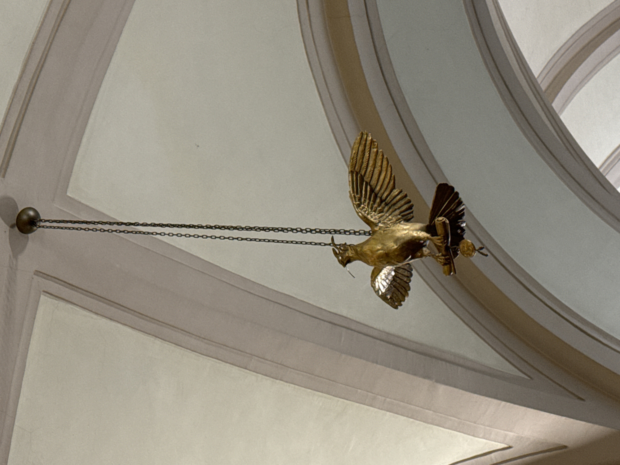 Ornate Saint Petersburg interior with frescoed ceiling and gilded bird