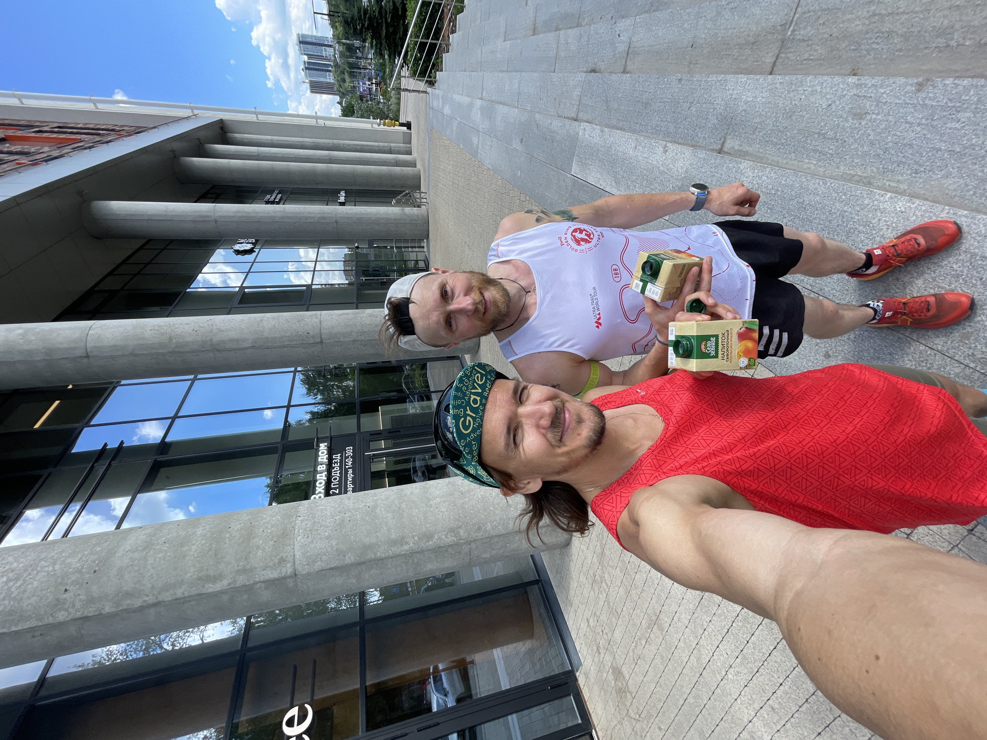 Trail run selfies through forest, starting from a modern building