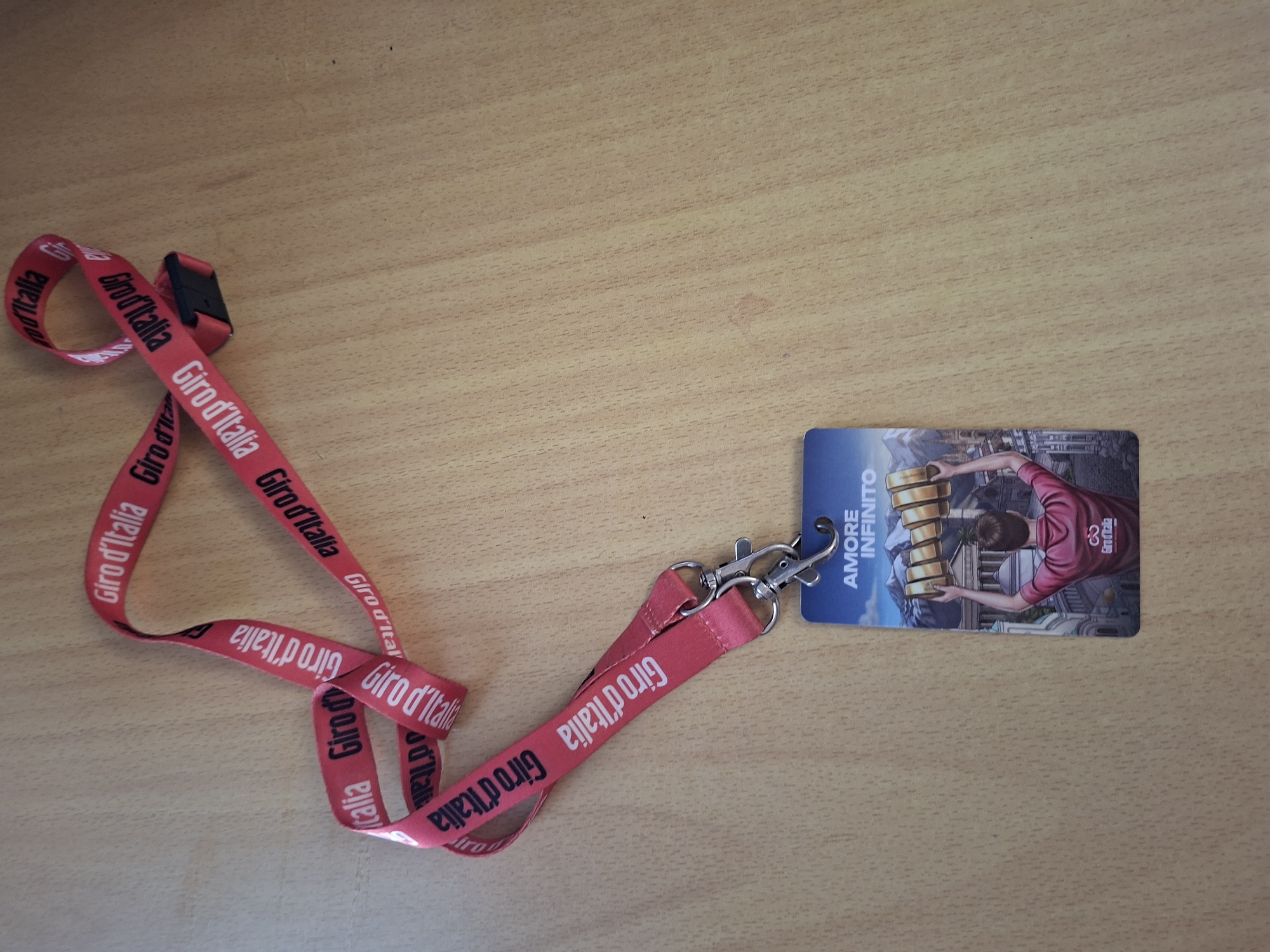 Giro d'Italia lanyard spotted on wooden surface in Bulgaria