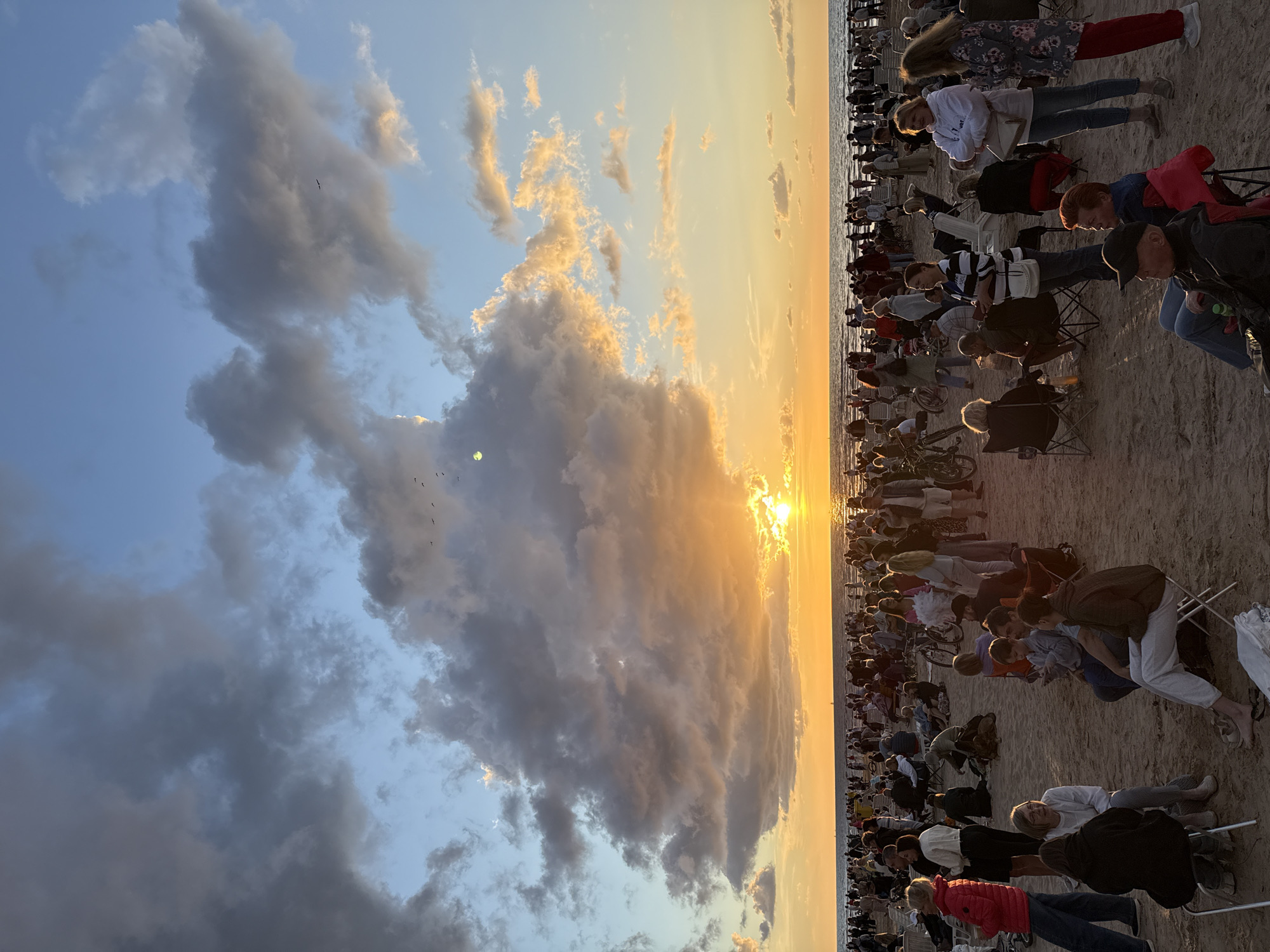 Beachside event draws a crowd at sunset near Riga