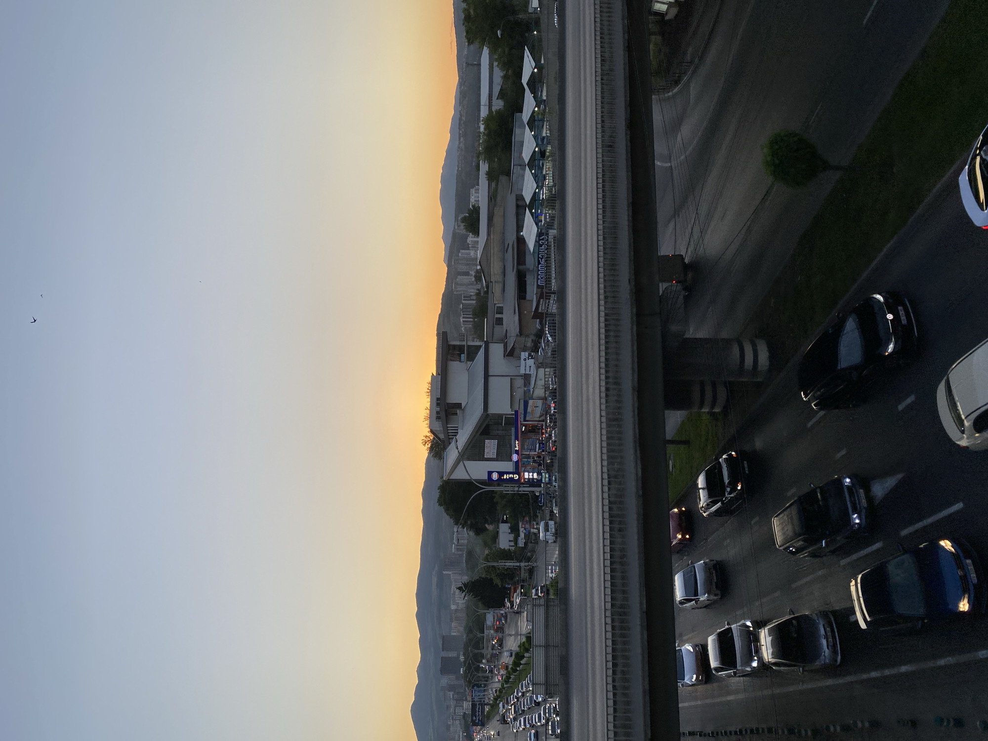 Tbilisi rooftop views at sunset, highway to industrial edge