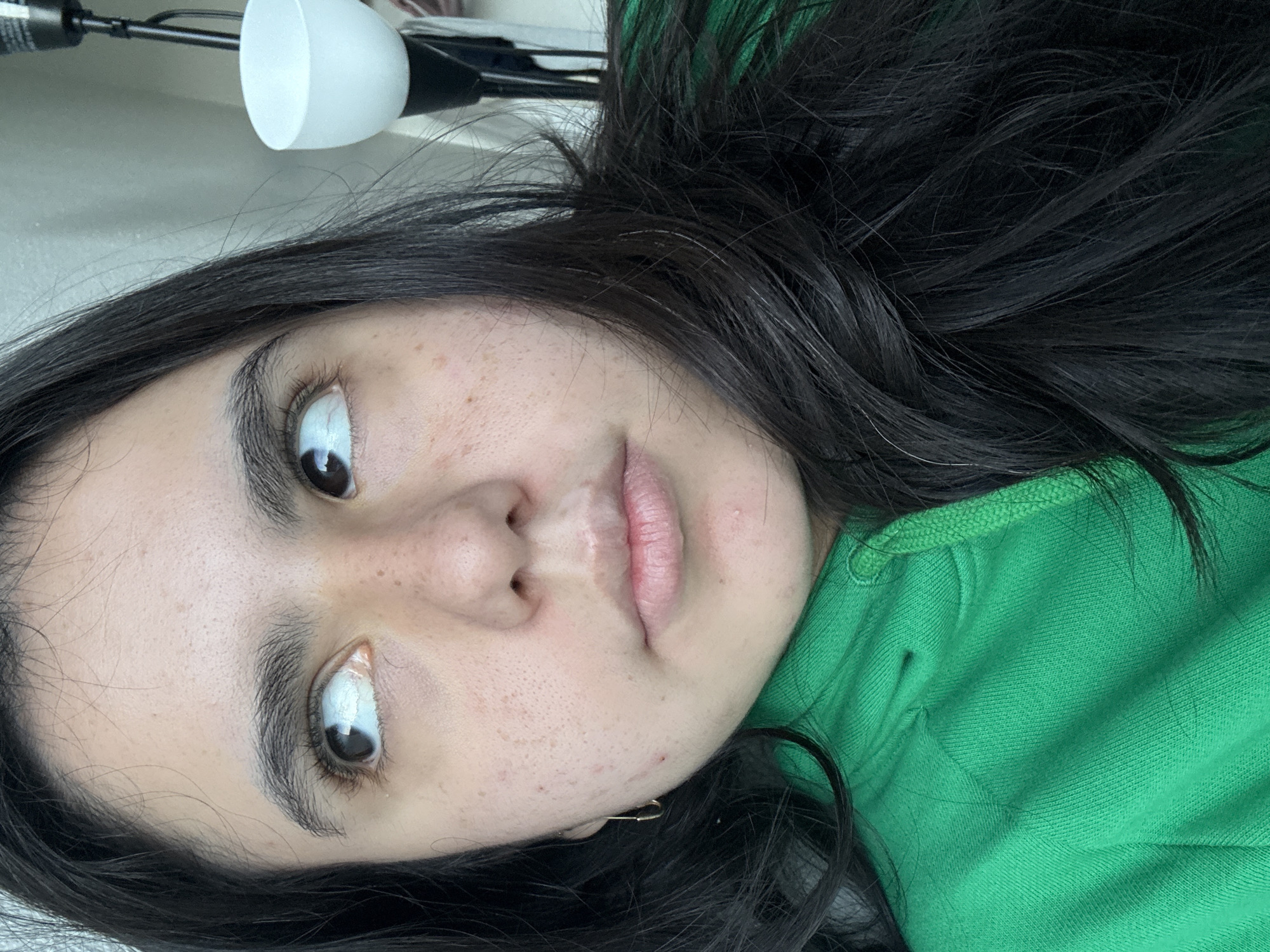 Woman poses with Texas State merchandise during Austin photo session