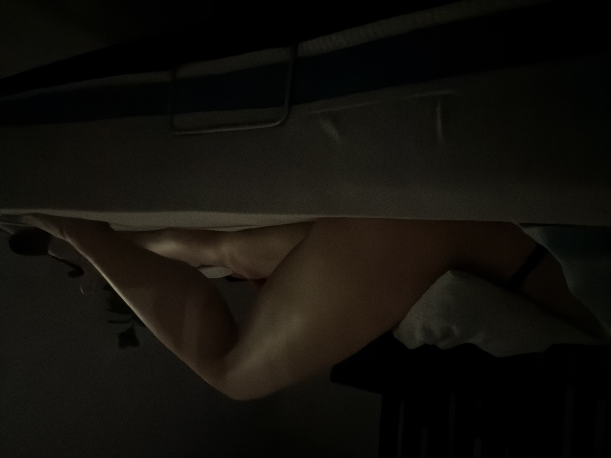 Person resting at home in Moscow apartment evening