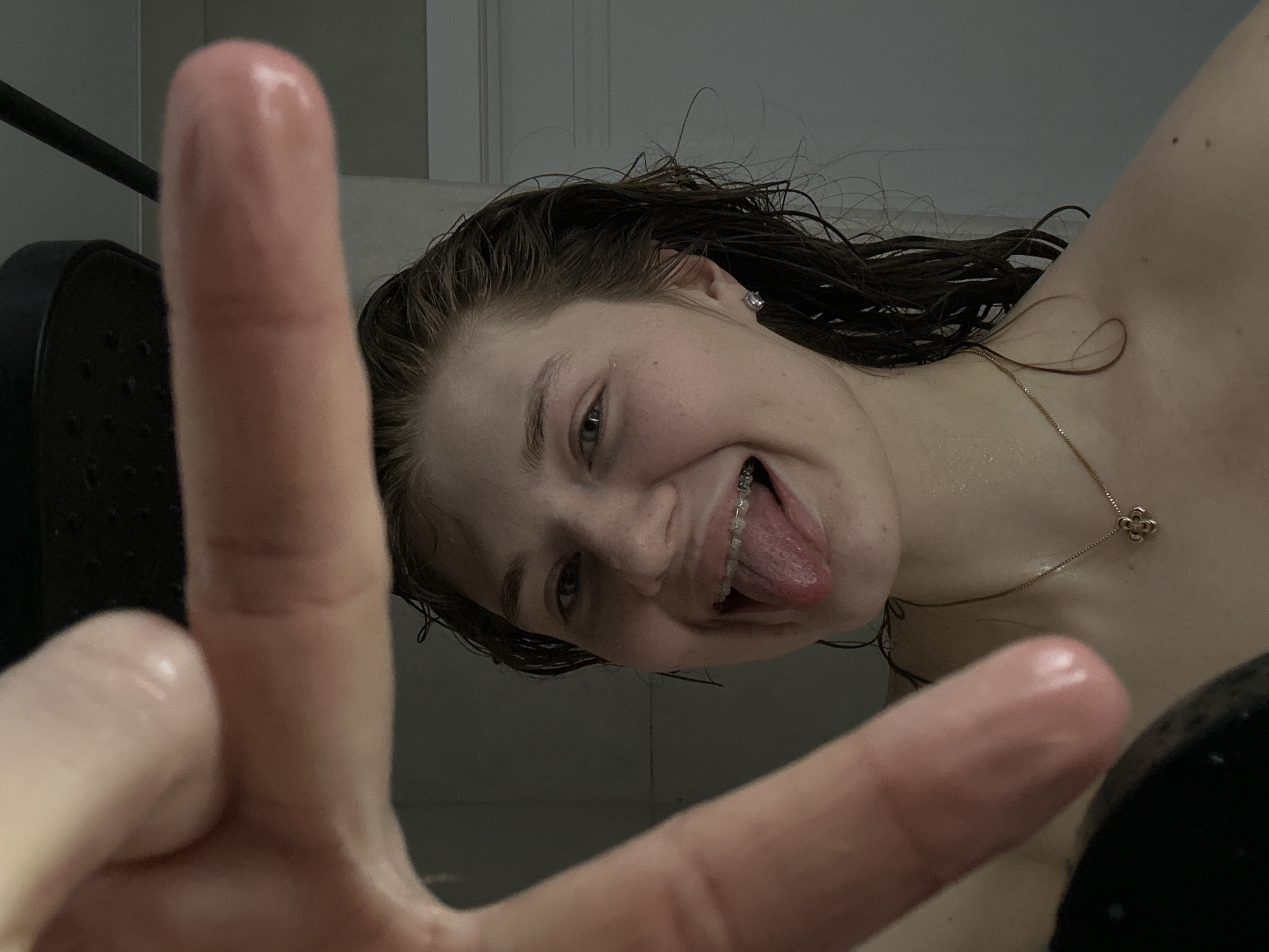 Person documents shower routine in Kazan apartment