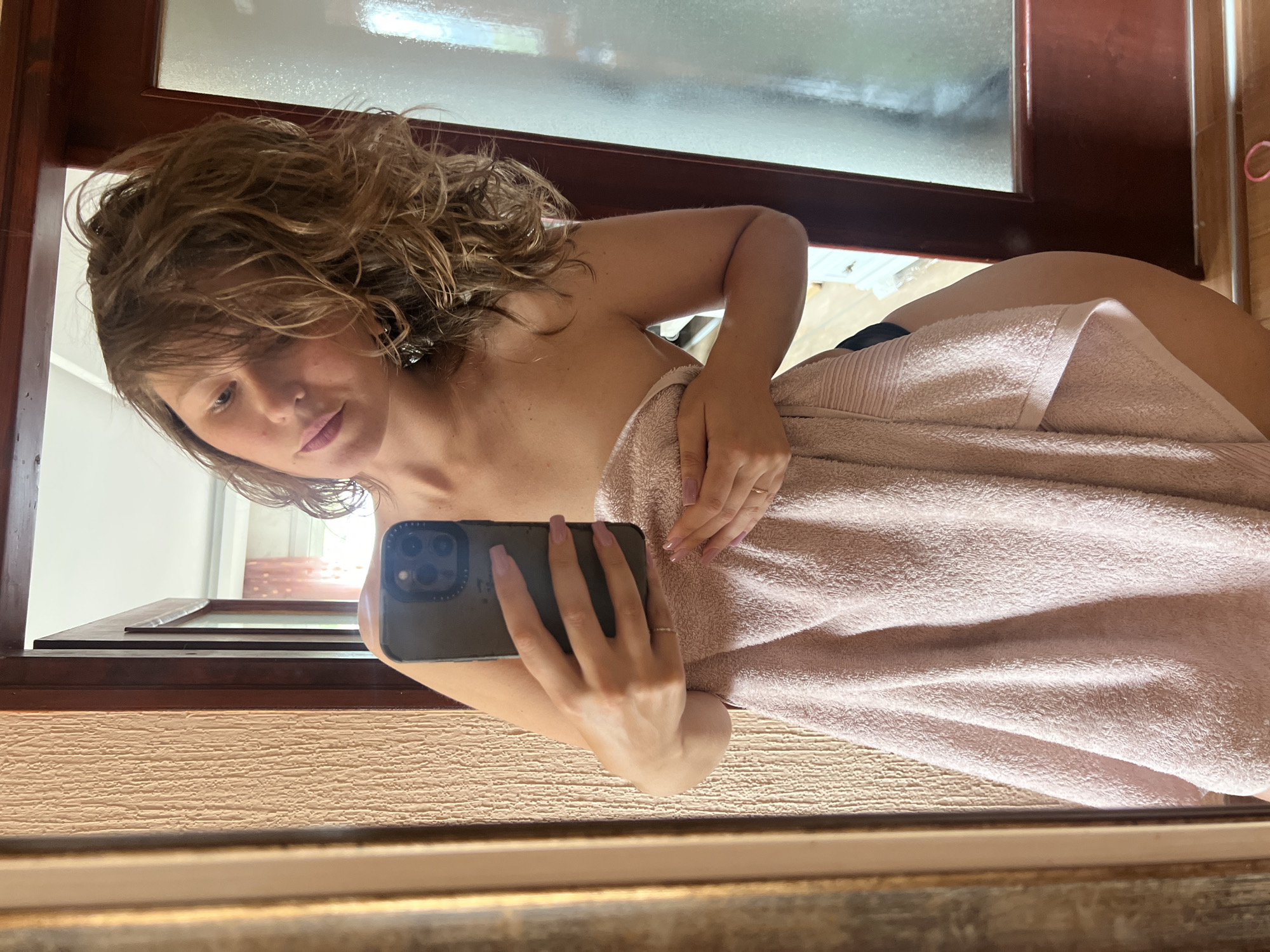 Woman takes mirror selfies in Podgorica apartment