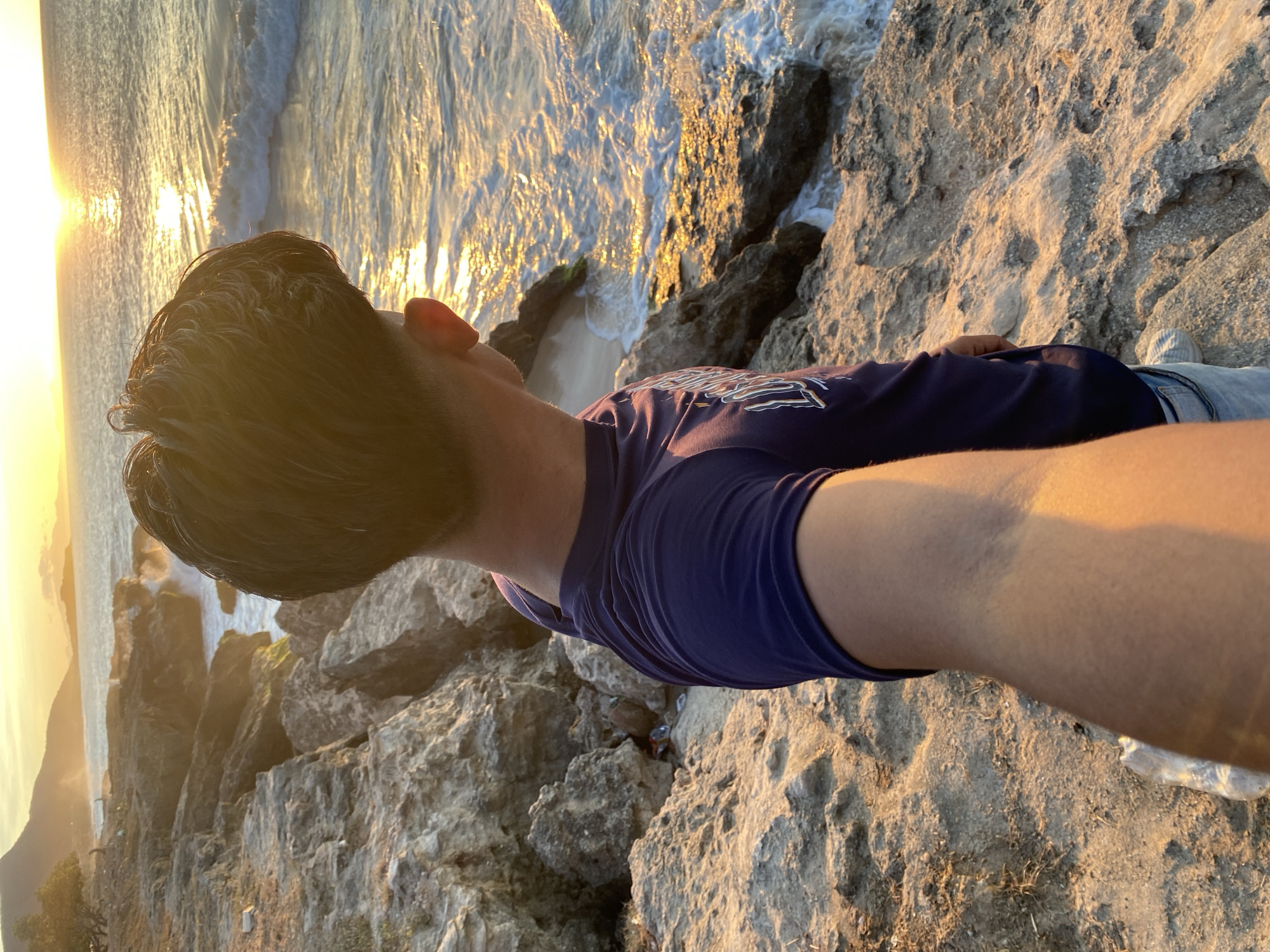 Sunset selfie session at Juan Griego beach rocks