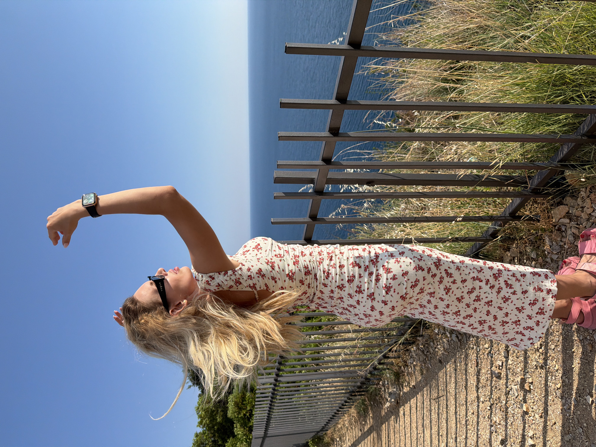 Woman explores Montenegro's Adriatic coast during afternoon sightseeing