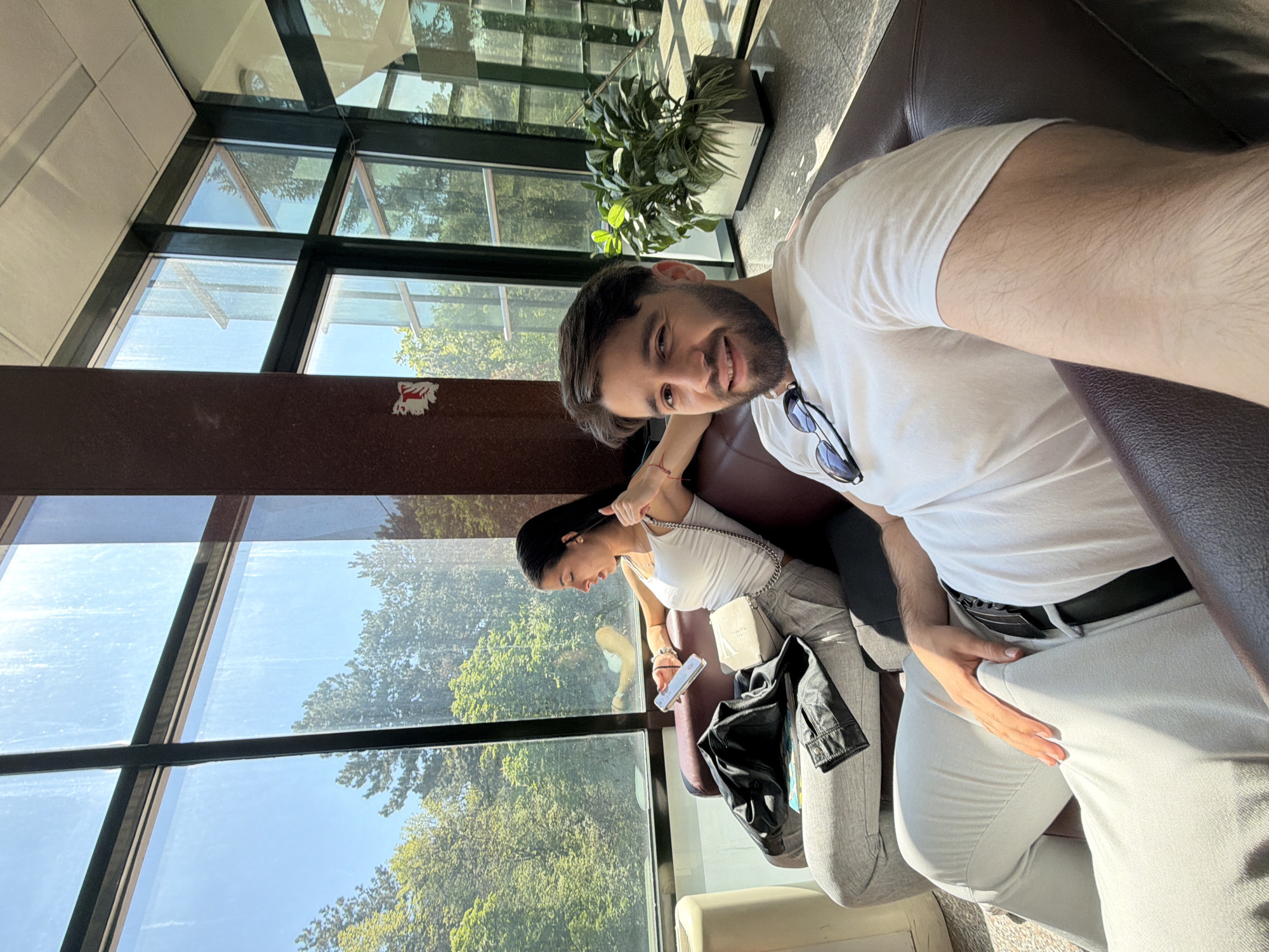 Couple takes selfie by window in Sofia building