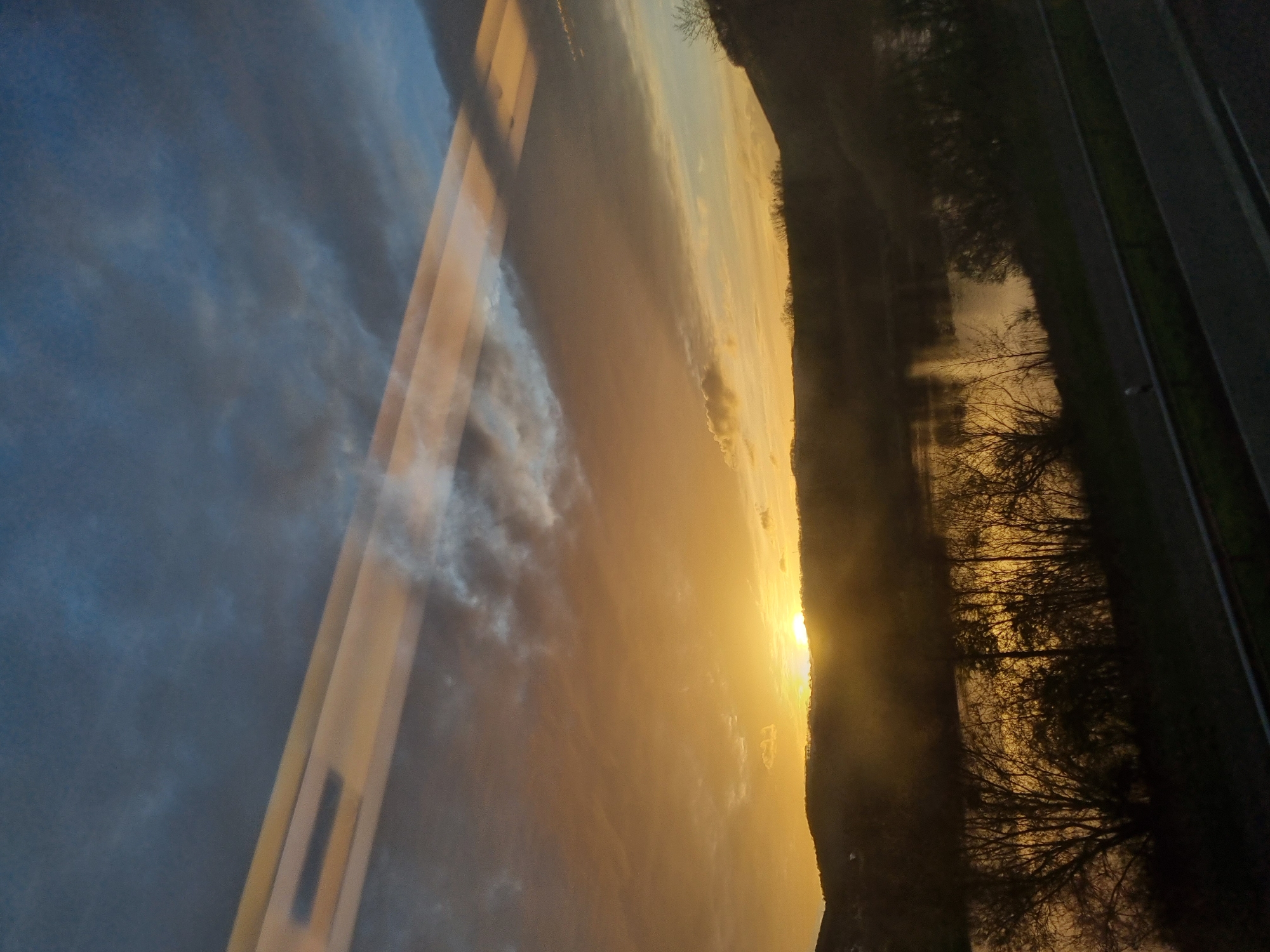 Sunset reflection and restaurant exterior documented in Saarburg