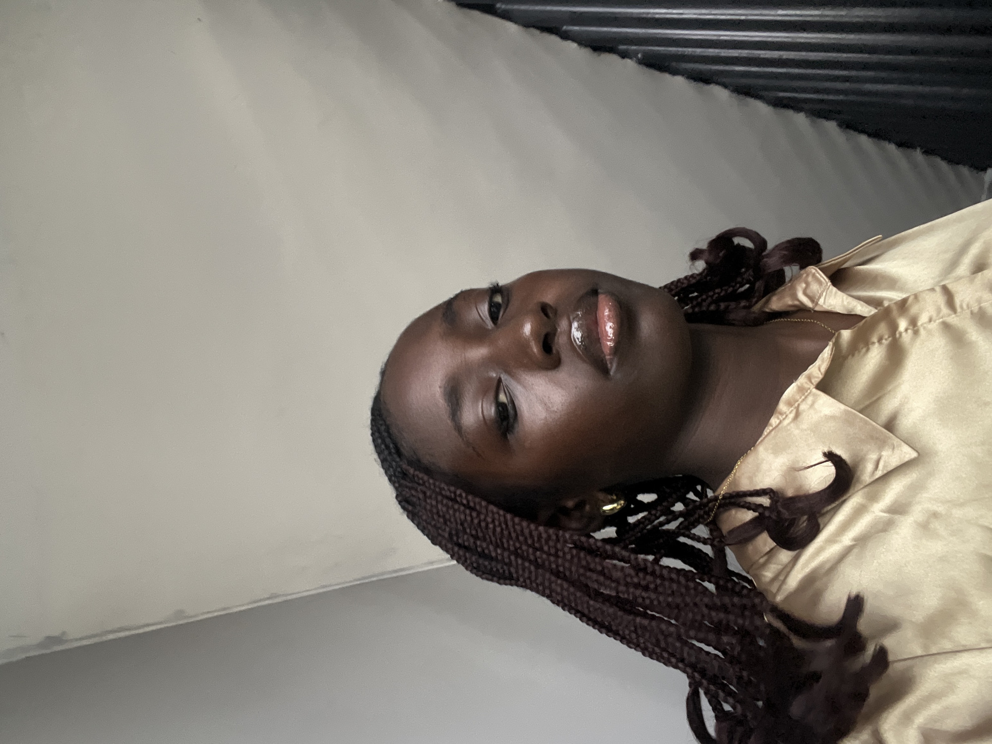 Woman films herself walking through building in Karum, Nigeria