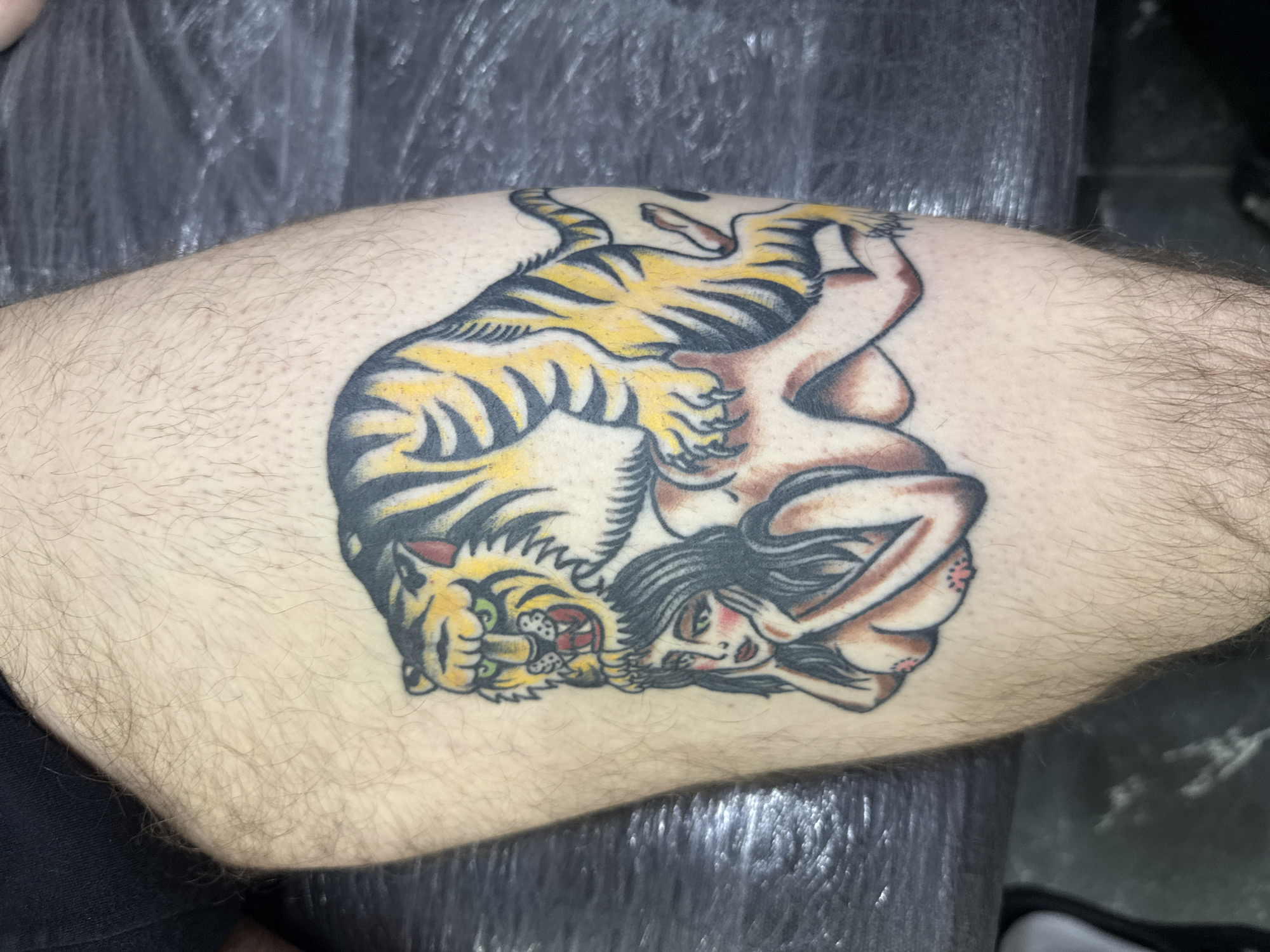 Moscow residents document tattoo art, motivational stickers indoors