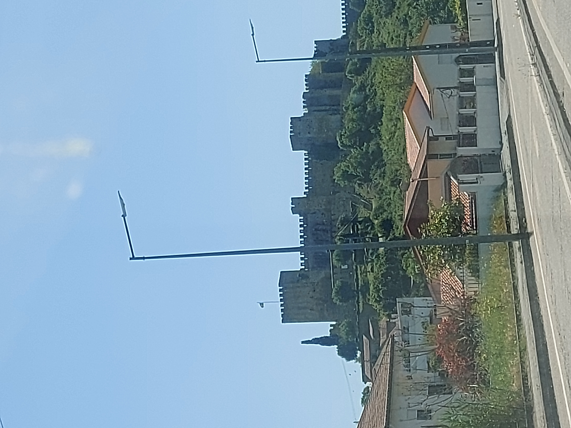 Historic Portuguese castle photographed from multiple angles in daylight