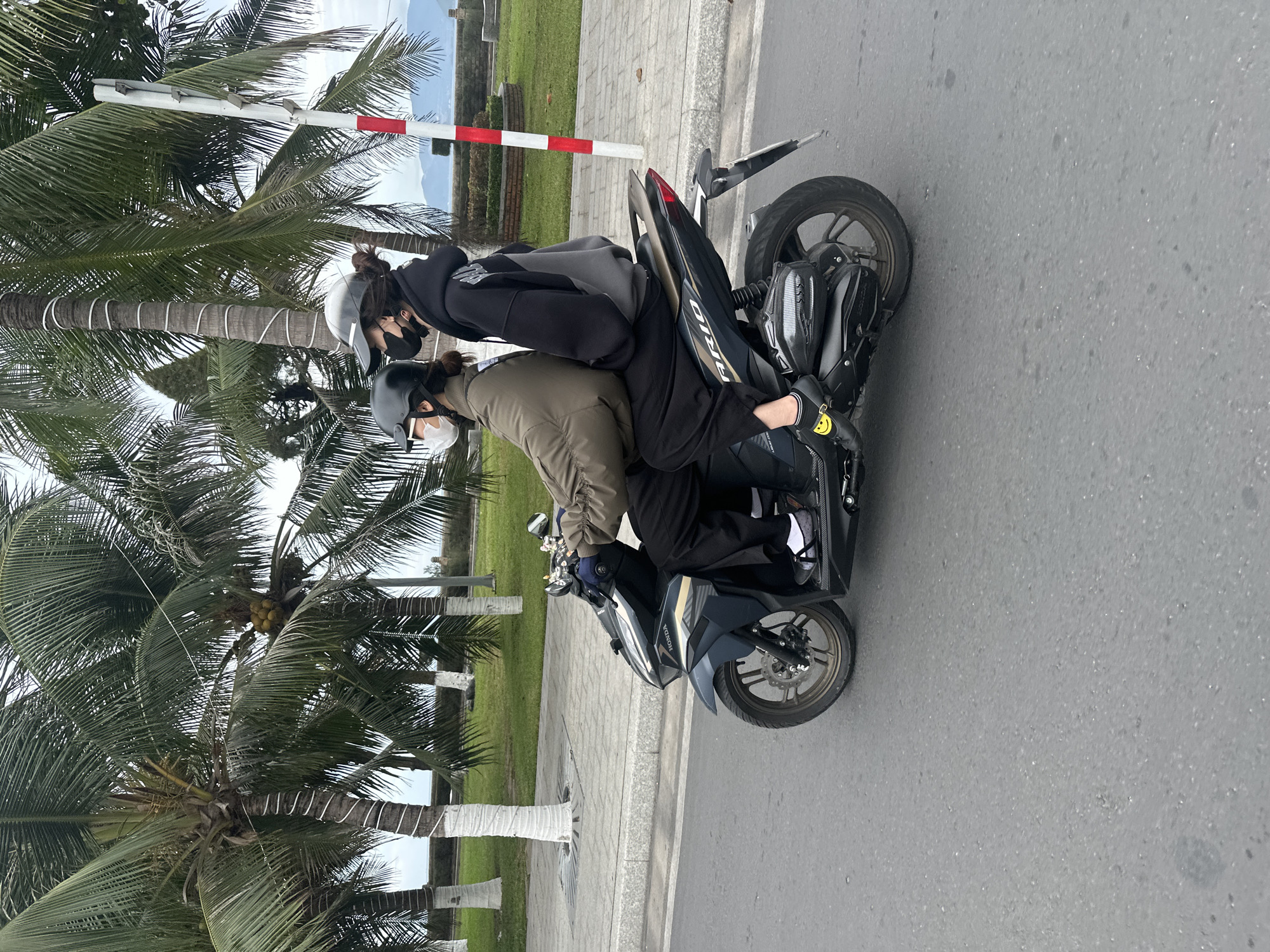 Motorcycle convoy with flags travels through Nha Trang