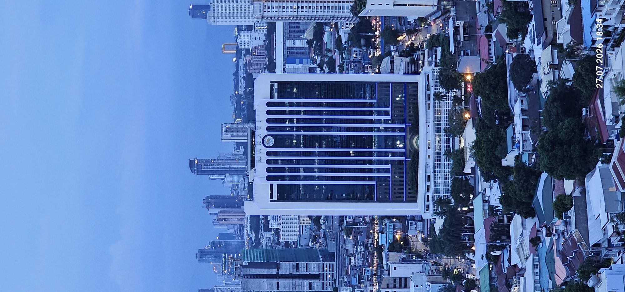 Makati skyline at dusk and night, multiple aerial angles
