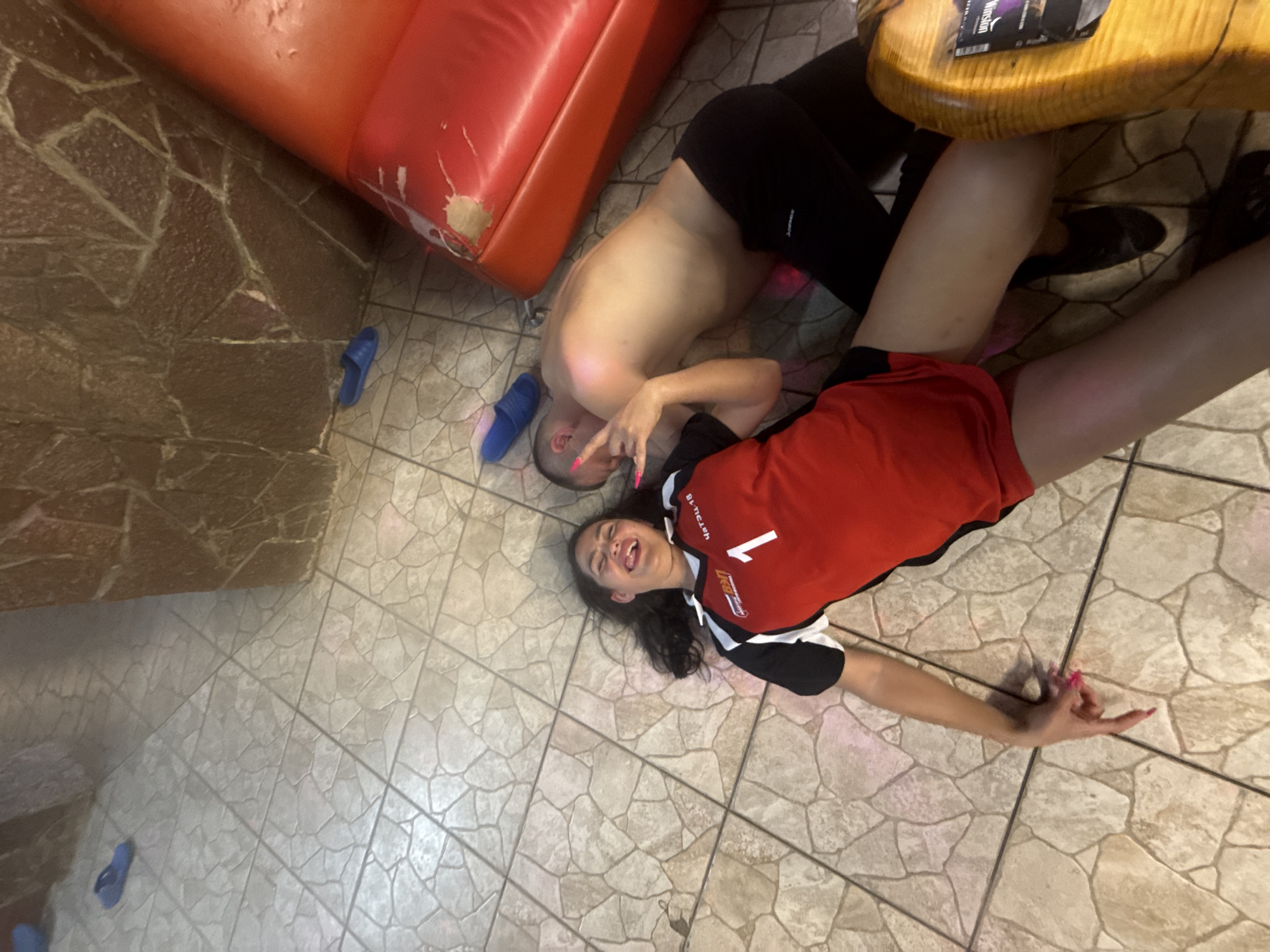 Couple observed resting on floor in Chaikovsky home