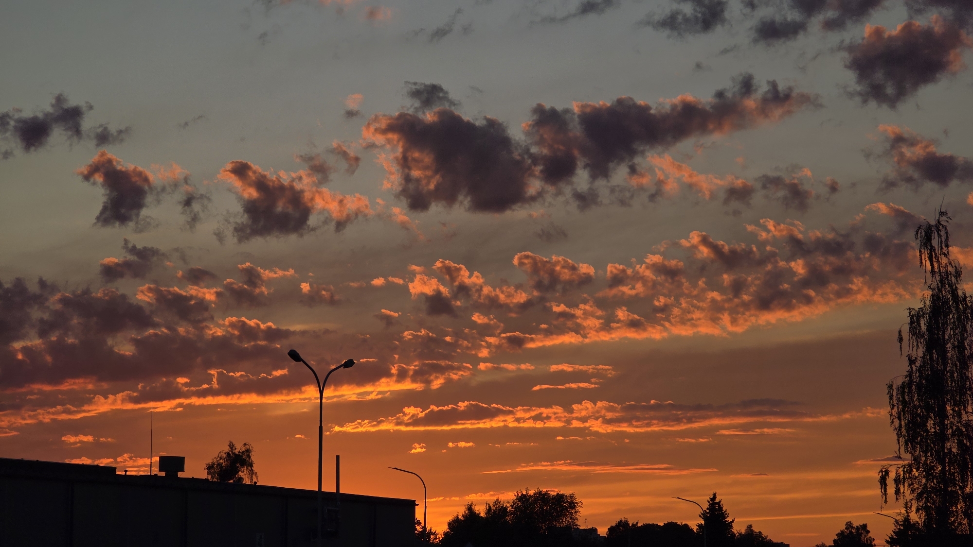 Vivid summer sunset over the Brest, Belarus skyline