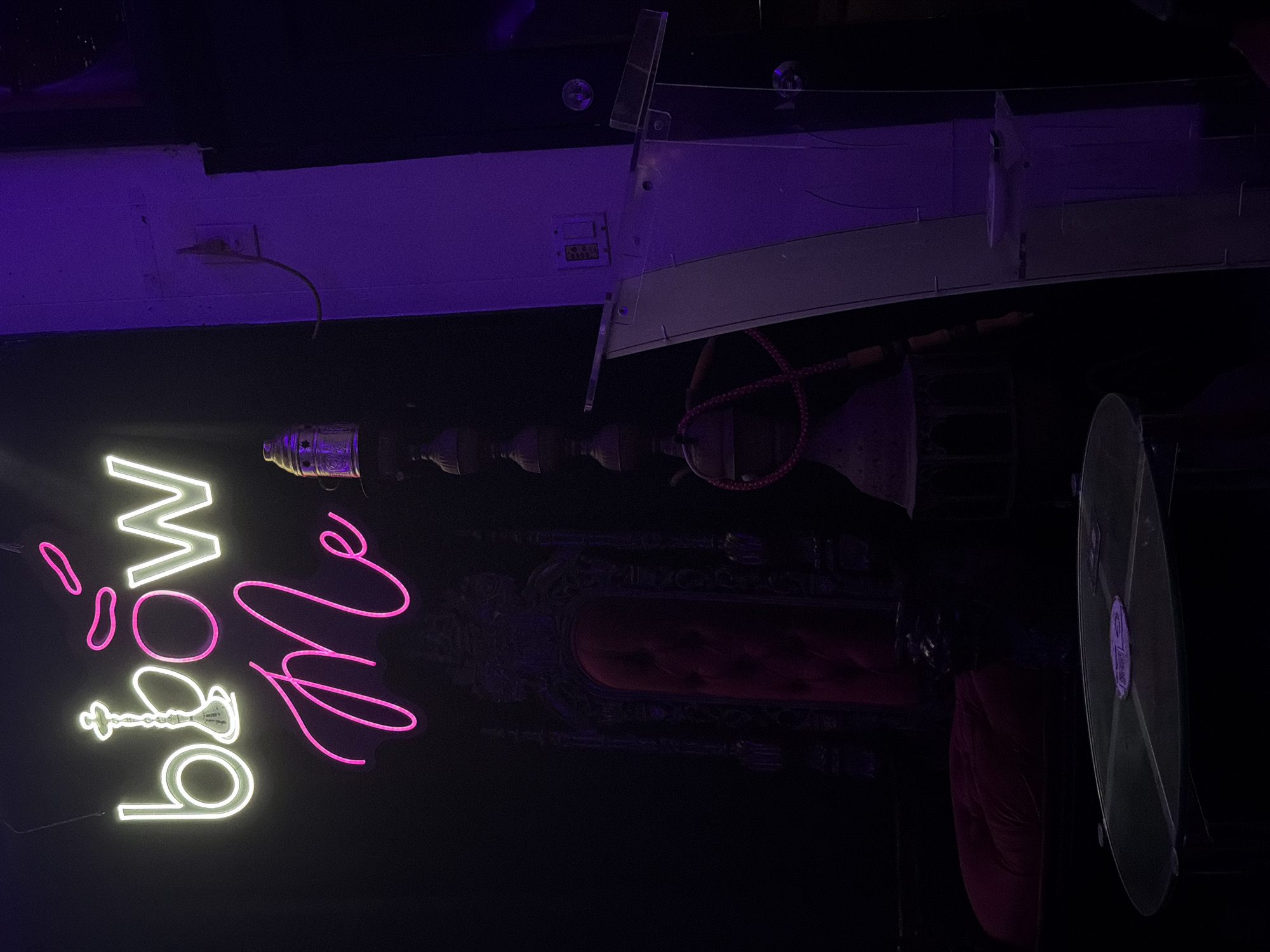 Bar interior with neon signage captured in Culver City