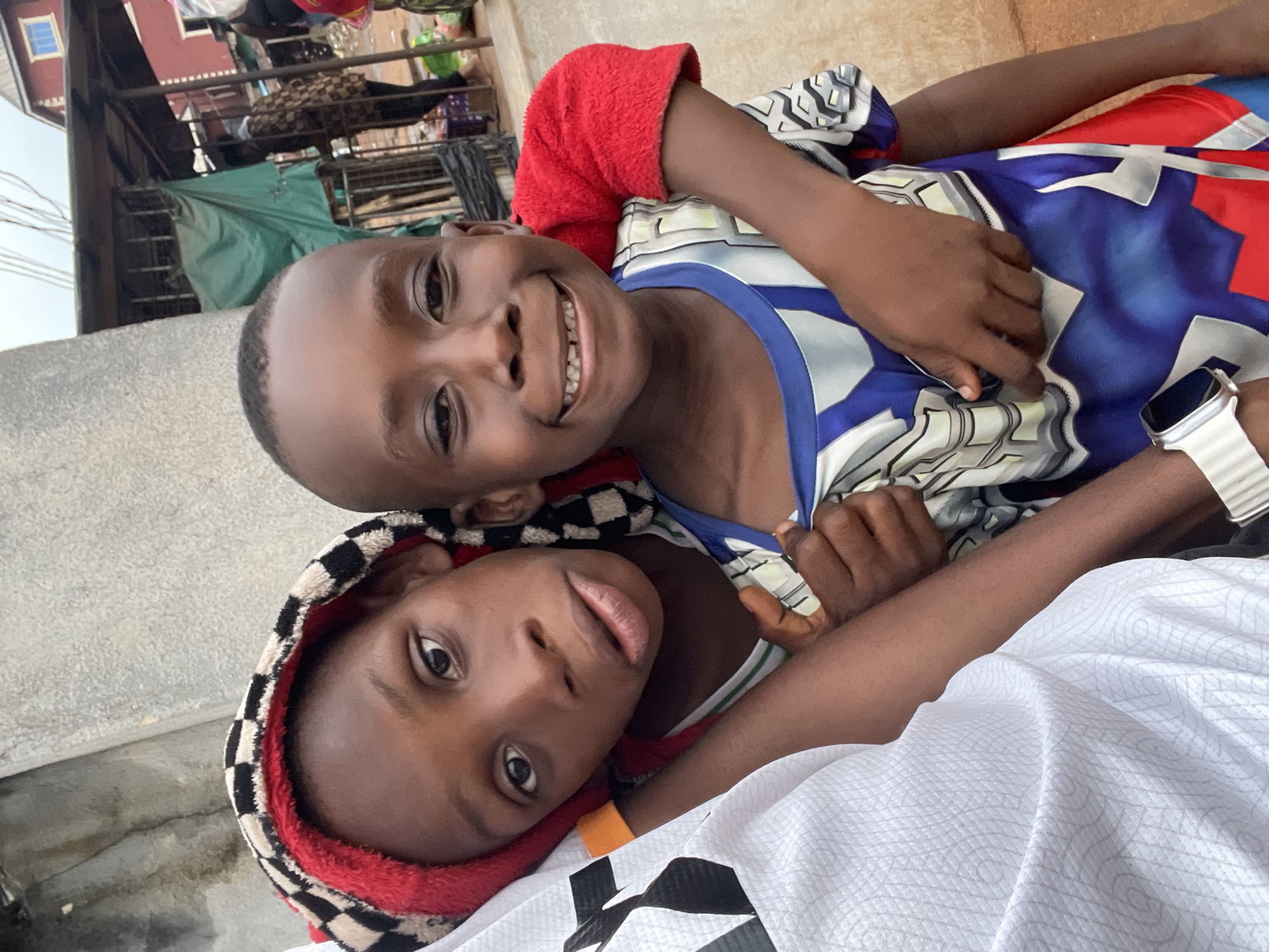 Children pose for photos in Onitsha, Nigeria