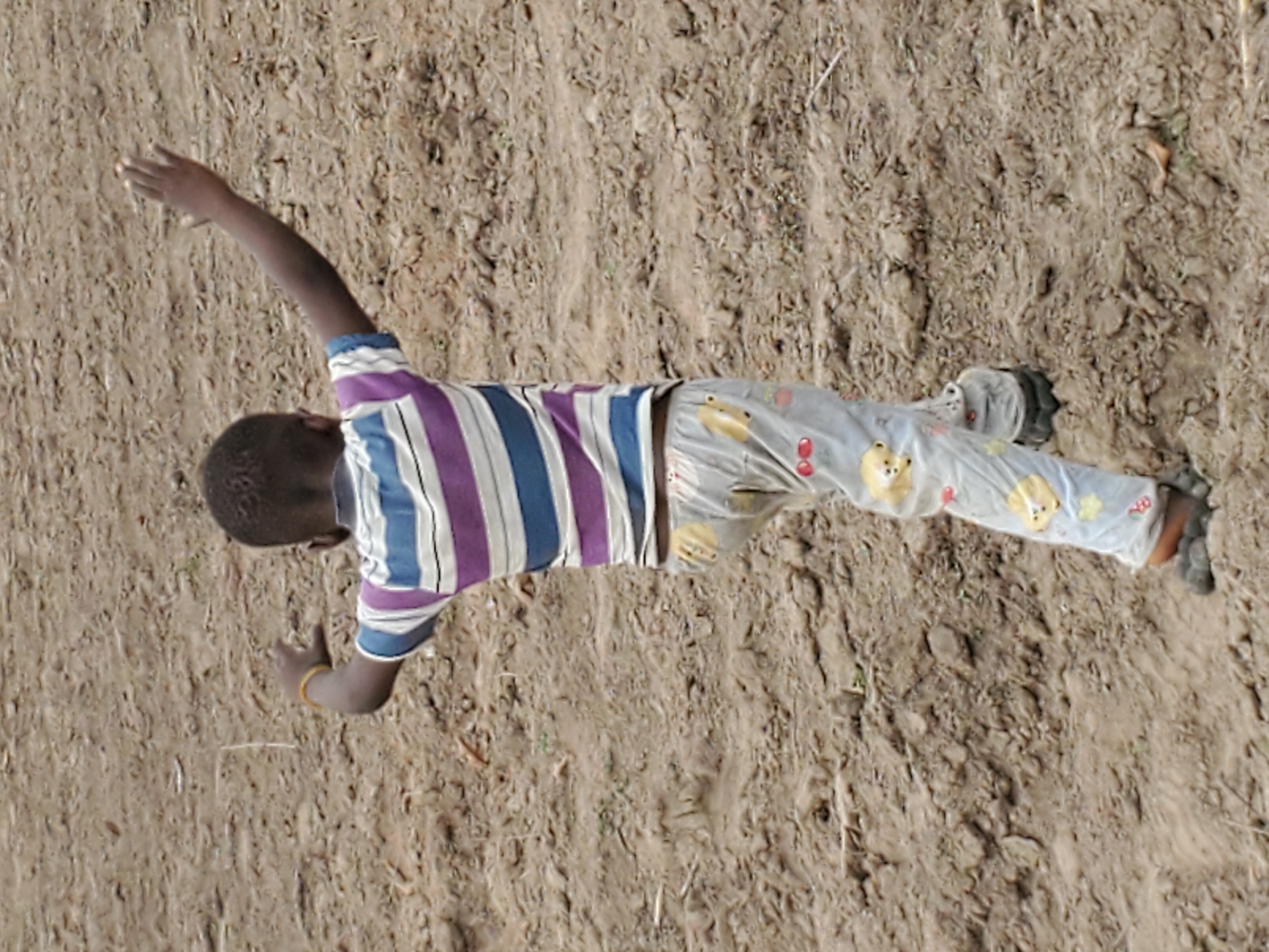 Child's morning activities documented in rural Mararaba, Nigeria