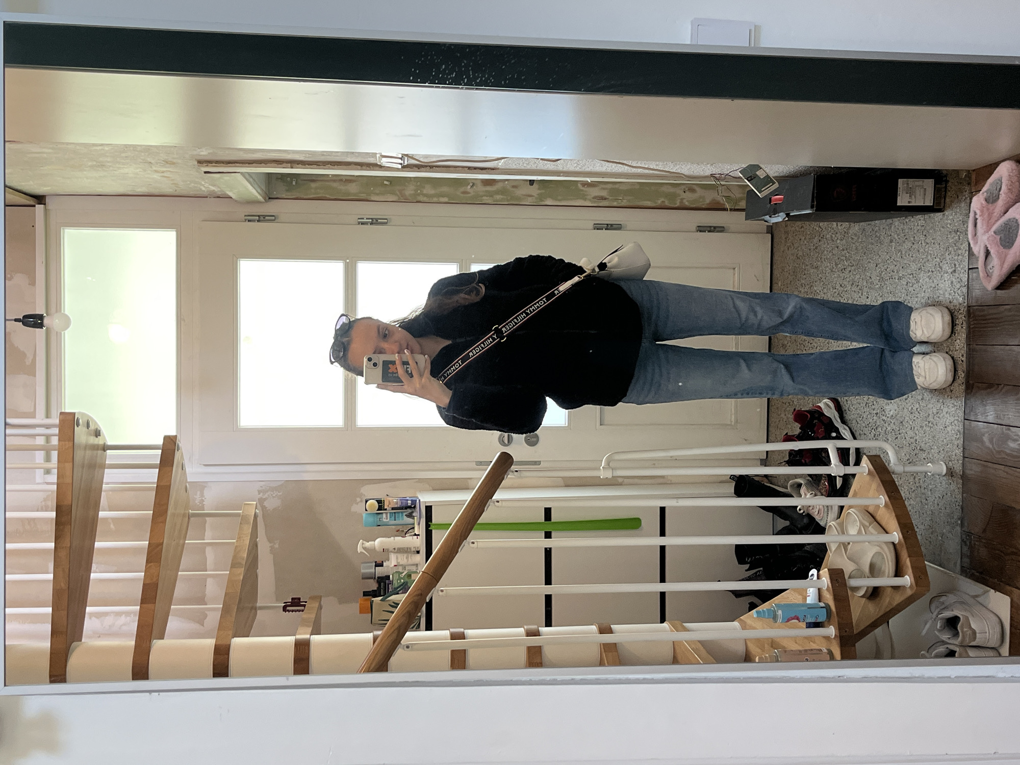 Woman takes selfies in Saarbrücken hallway Sunday morning
