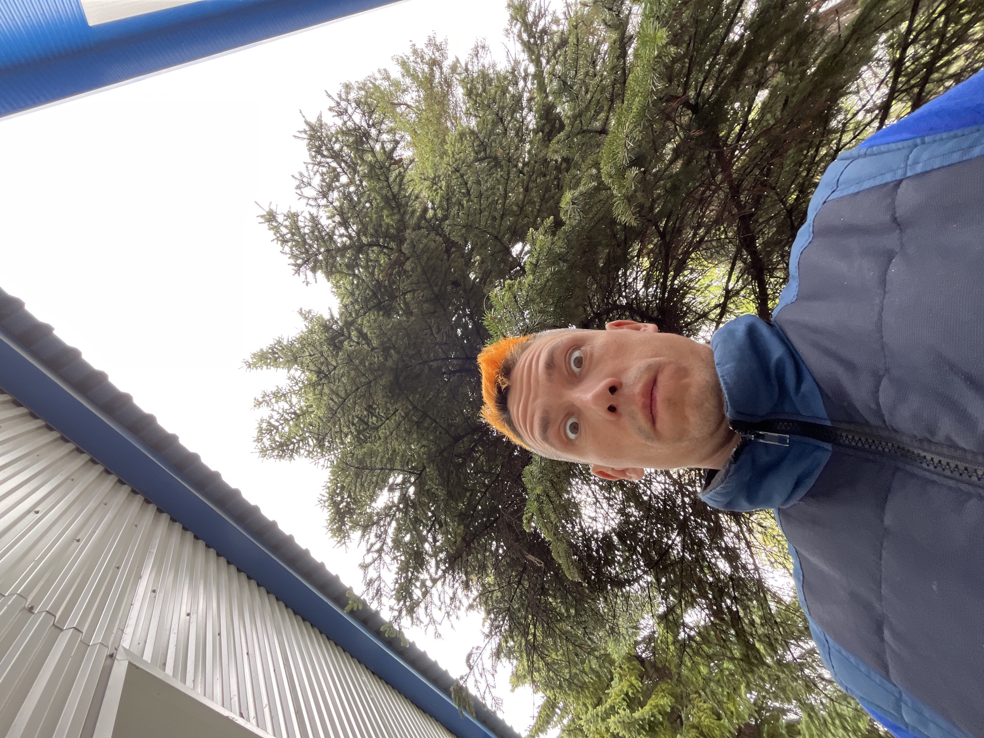 Man Takes Surprised Selfie Outdoors in Chaikovsky, Russia