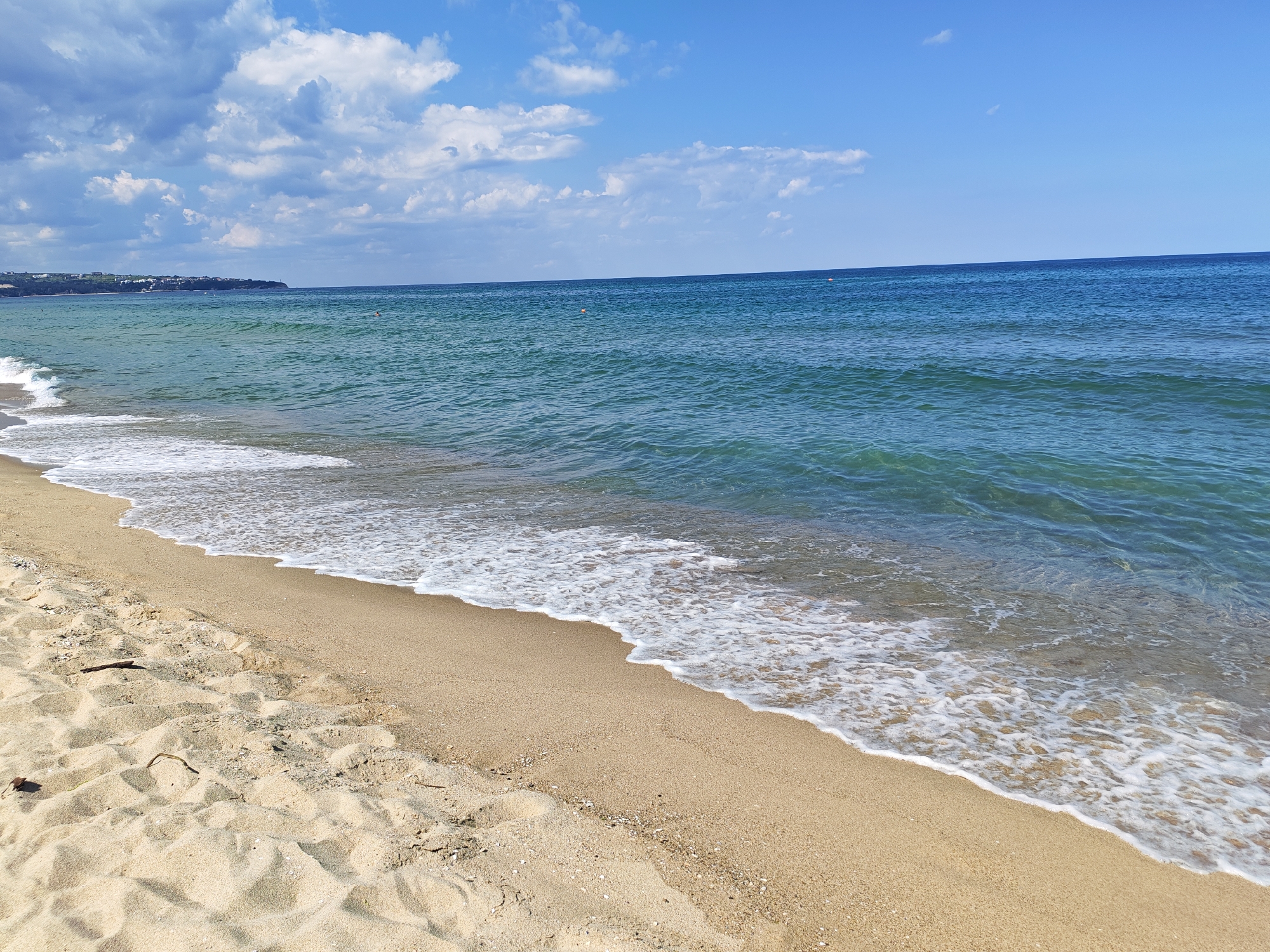 Calm turquoise waters and clear skies at Obzor beach