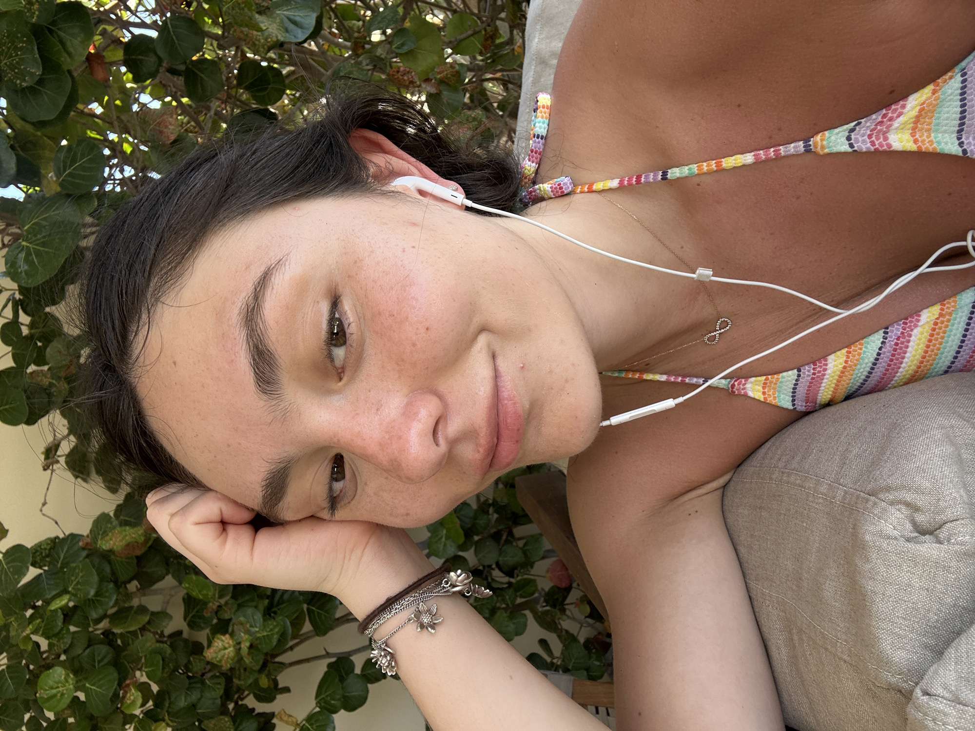 Woman spending leisure time at Playa Blanca resort patio