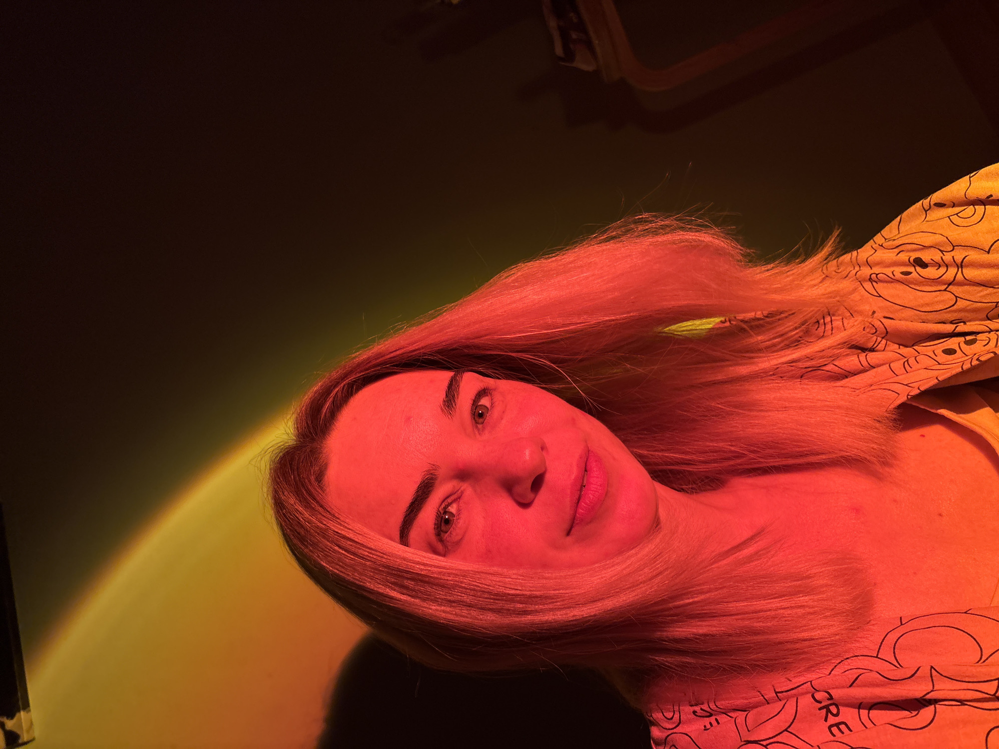 Cozy night in: cats, candy, and warm mood lighting