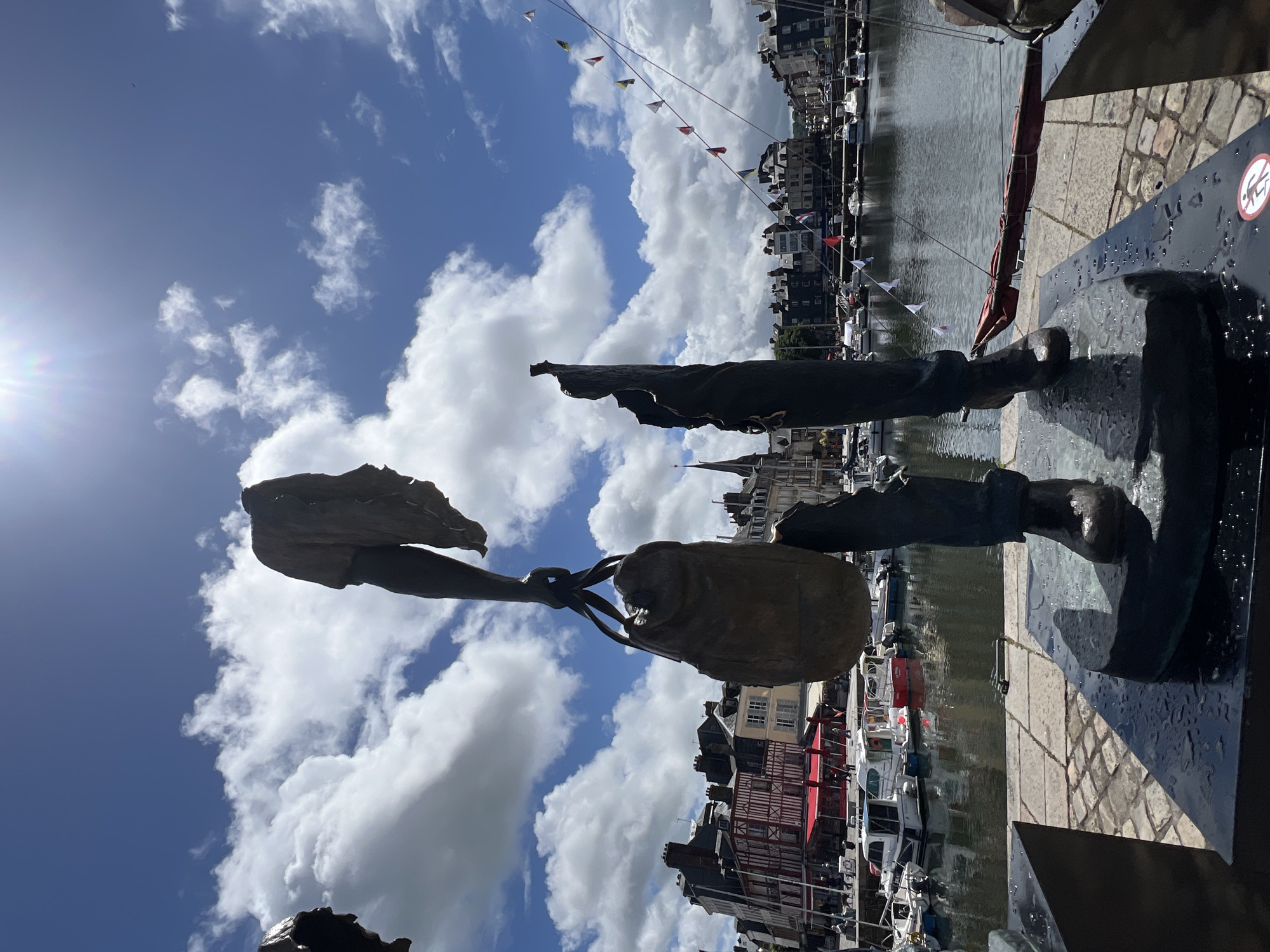 Everyday harbor life documented in Honfleur's Old Port district