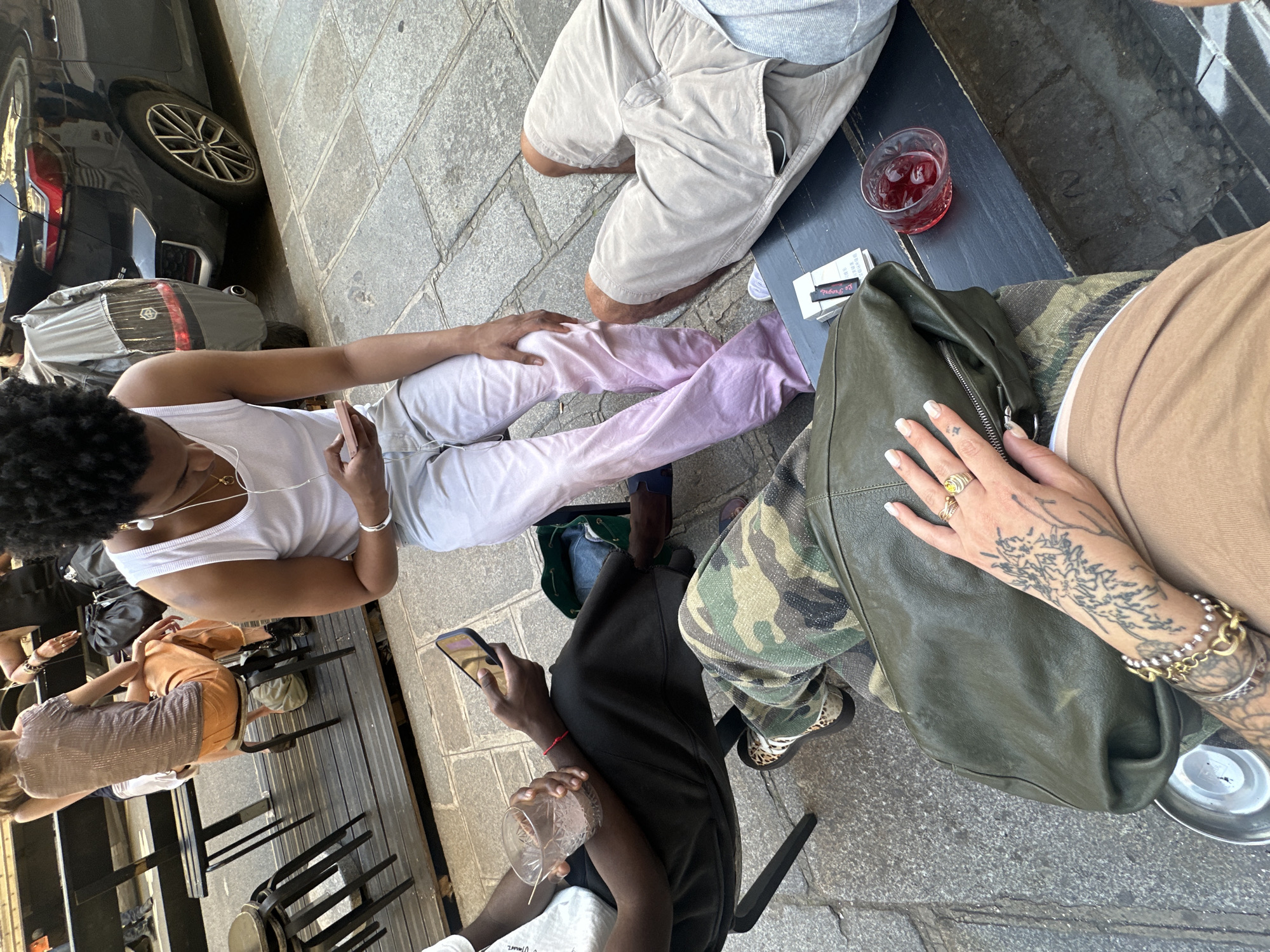 Ordinary street life documented across central Paris during evening hours