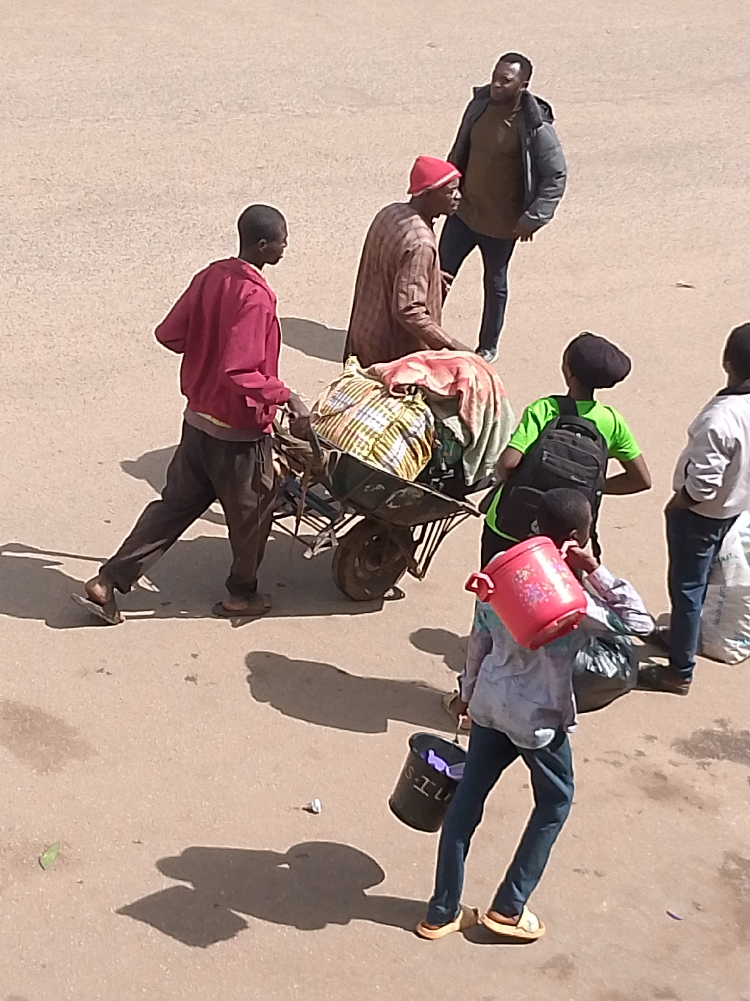 Morning street life documented across commercial Bukuru, Nigeria