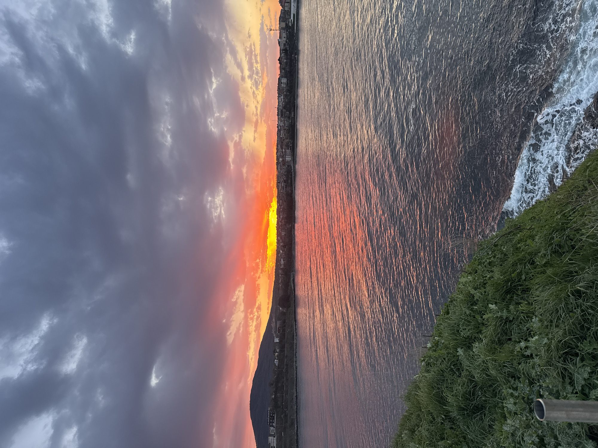 Sunset documented over coastal Tsarevo, Bulgaria with Orthodox cross