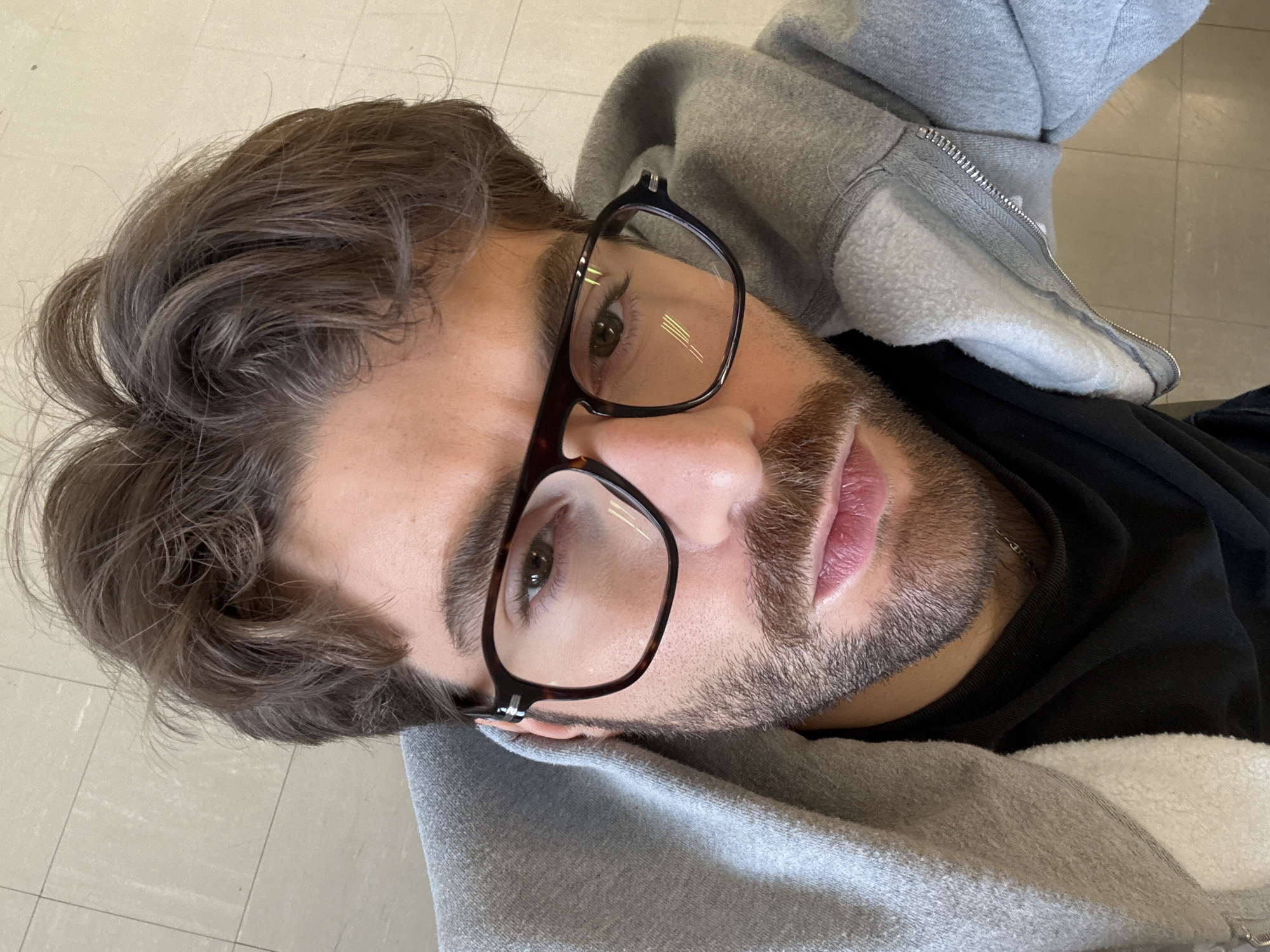 Man photographed multiple times in Montreal office workspace