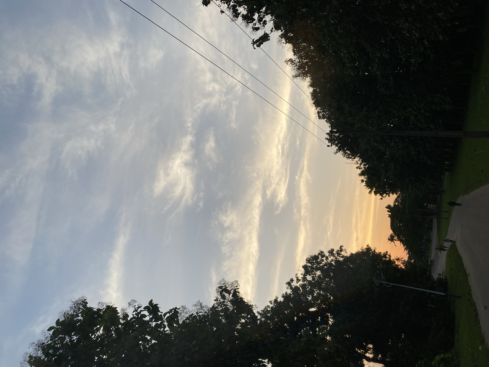 Dusk settles over a landscaped park in Iju, Nigeria