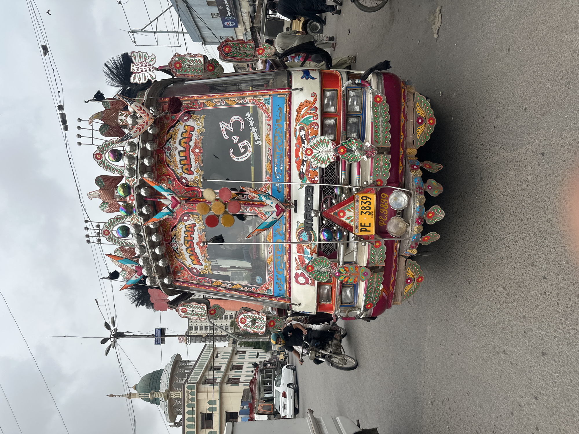 Ornate bus and street life in Karachi