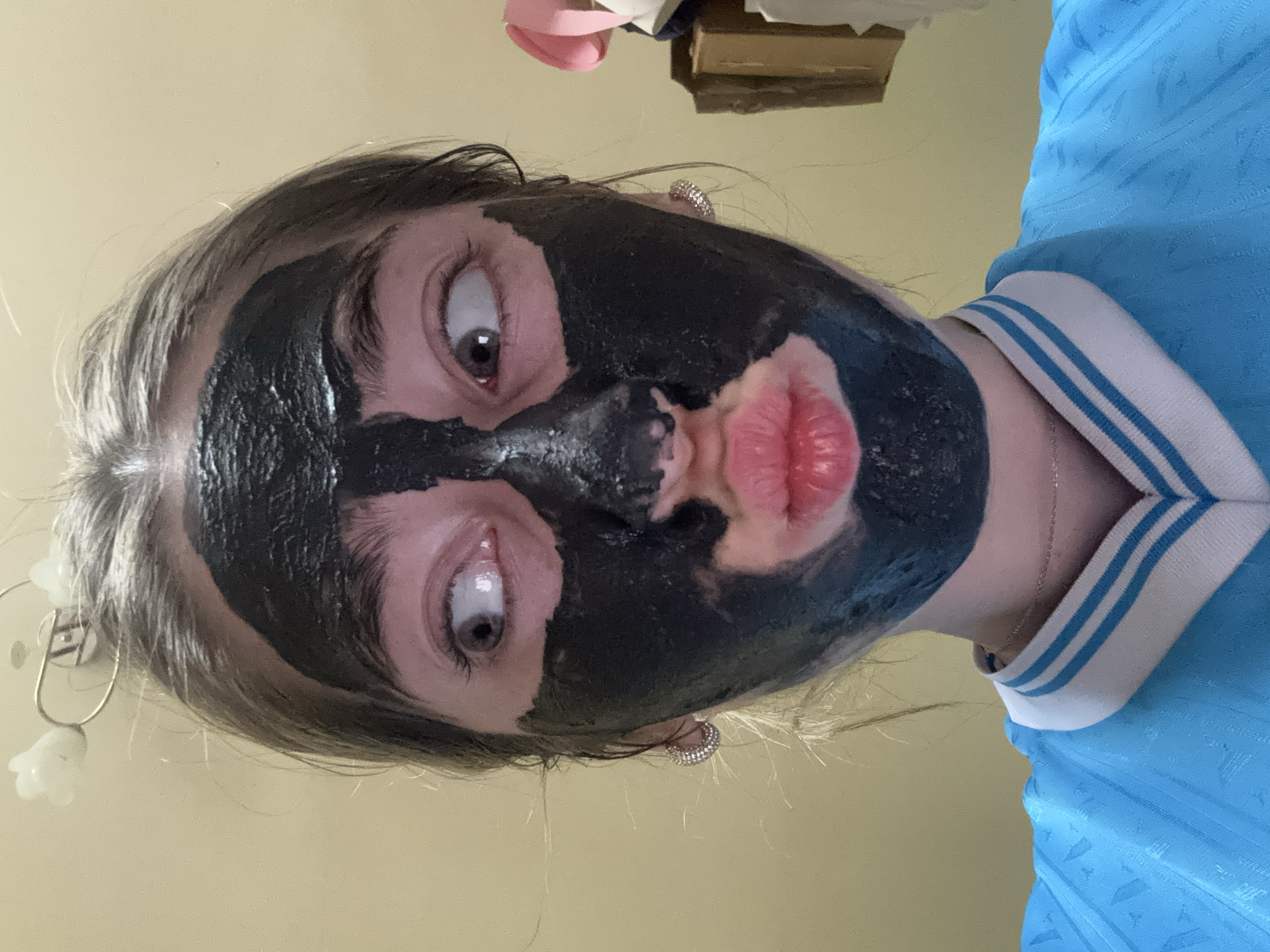 Person in Hungarian jersey makes kissing face with darkened face