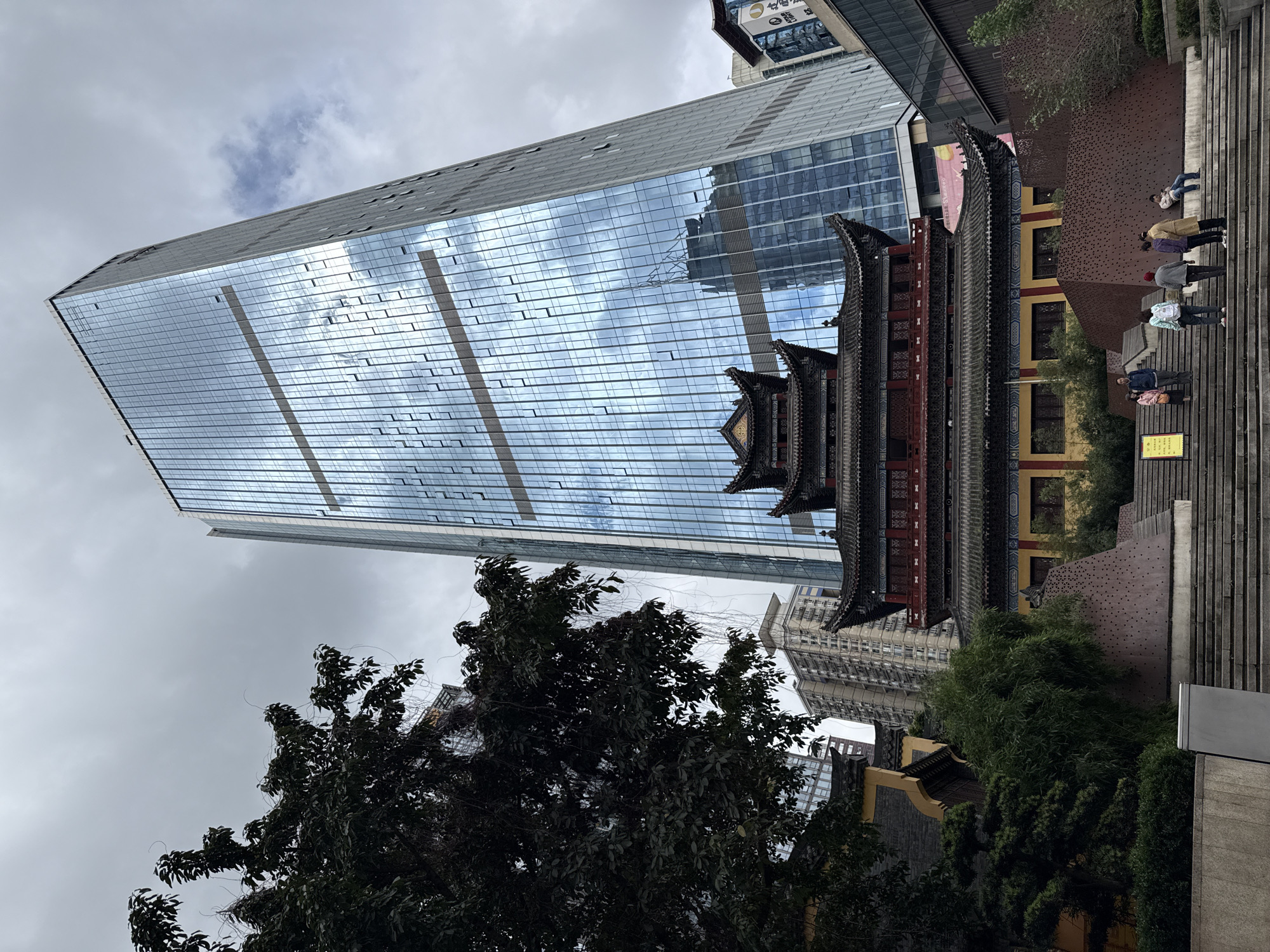 Modern skyscraper and traditional pagoda captured in Yuzhong District