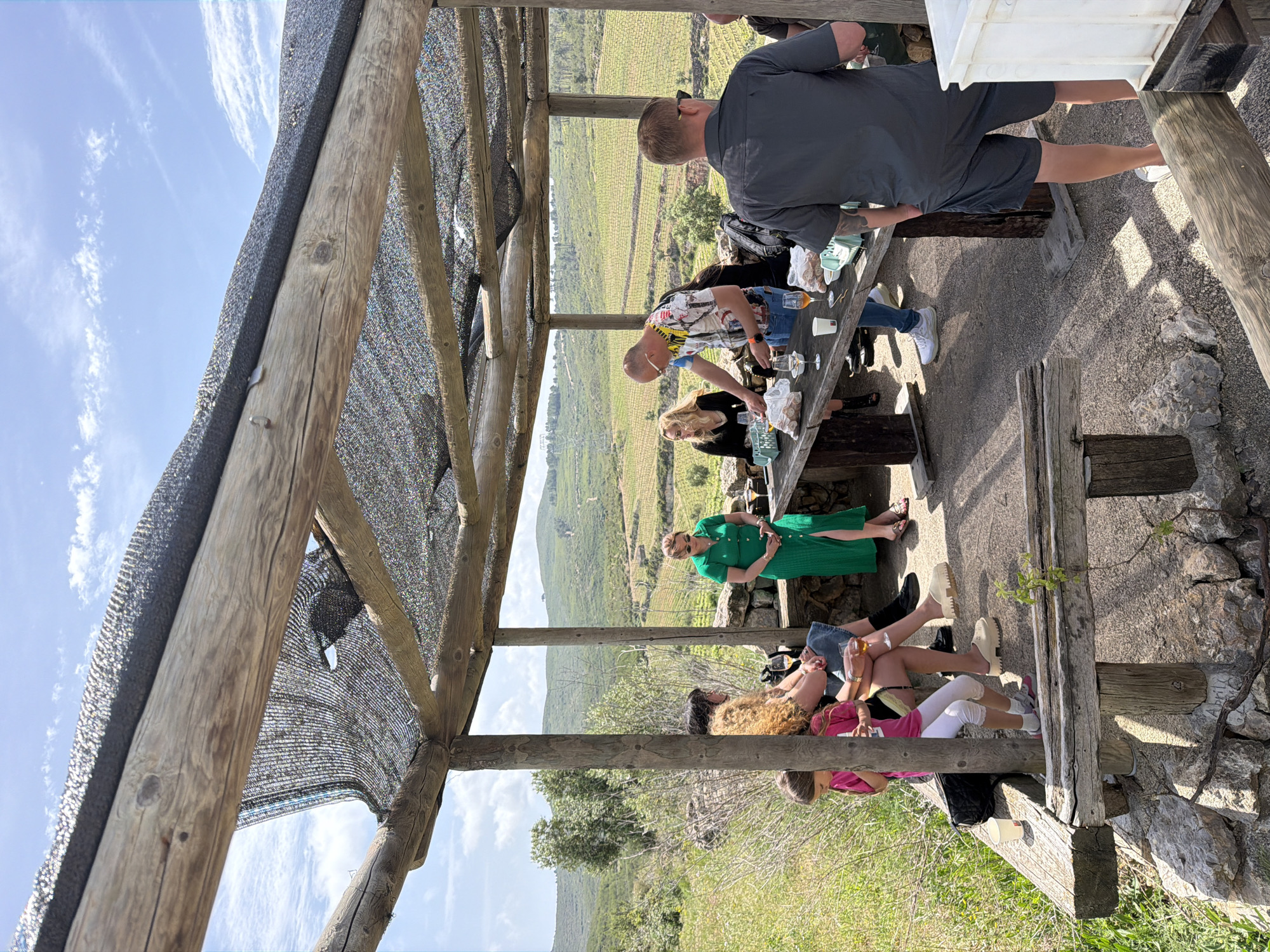 Social gathering observed under pergola in Bonastre, Spain