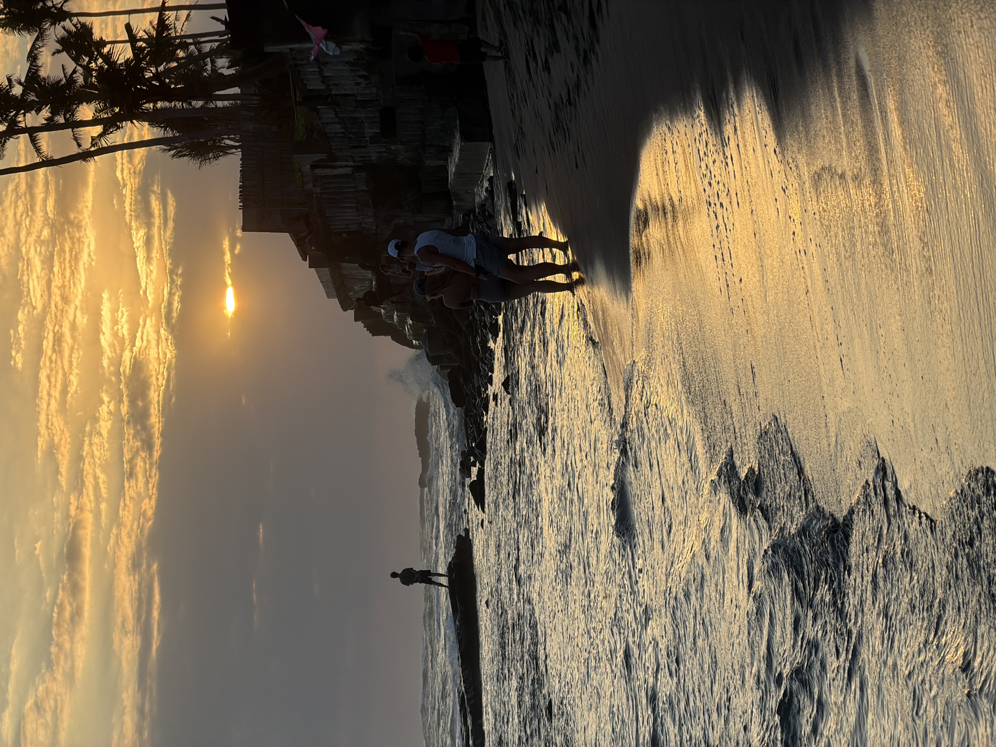 Sunset gatherings documented along Mengwi Indonesia coastline