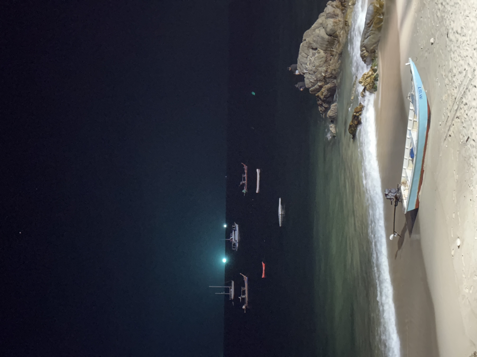 Sunset observed at Patong Beach with boats offshore
