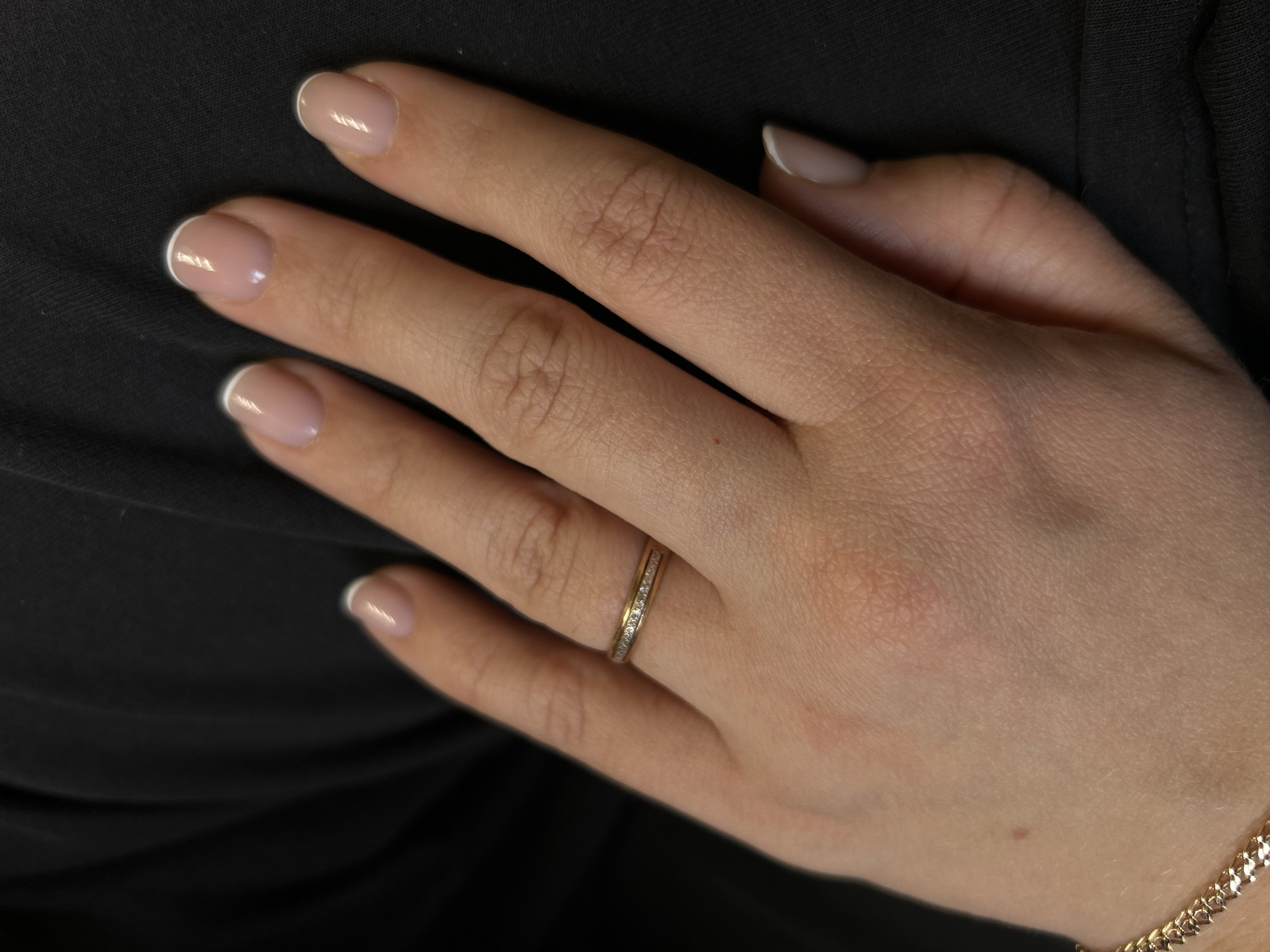Close-up photos document keyboard, tattoos, jewelry in Russia