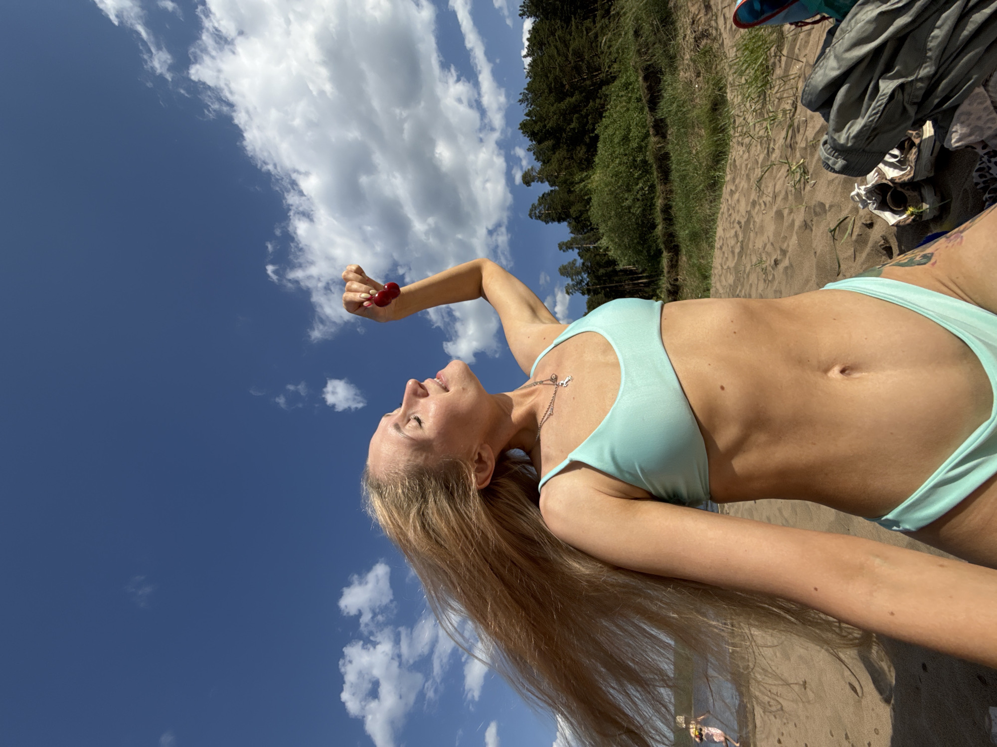 Woman enjoys beach day in Chaikovsky, Russia