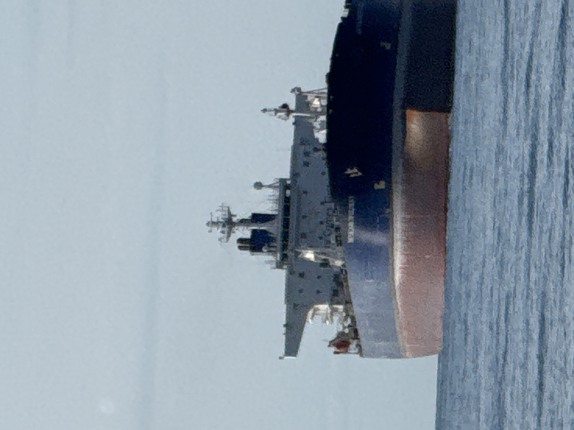 Fishing off Teriberka with a cargo ship passing nearby