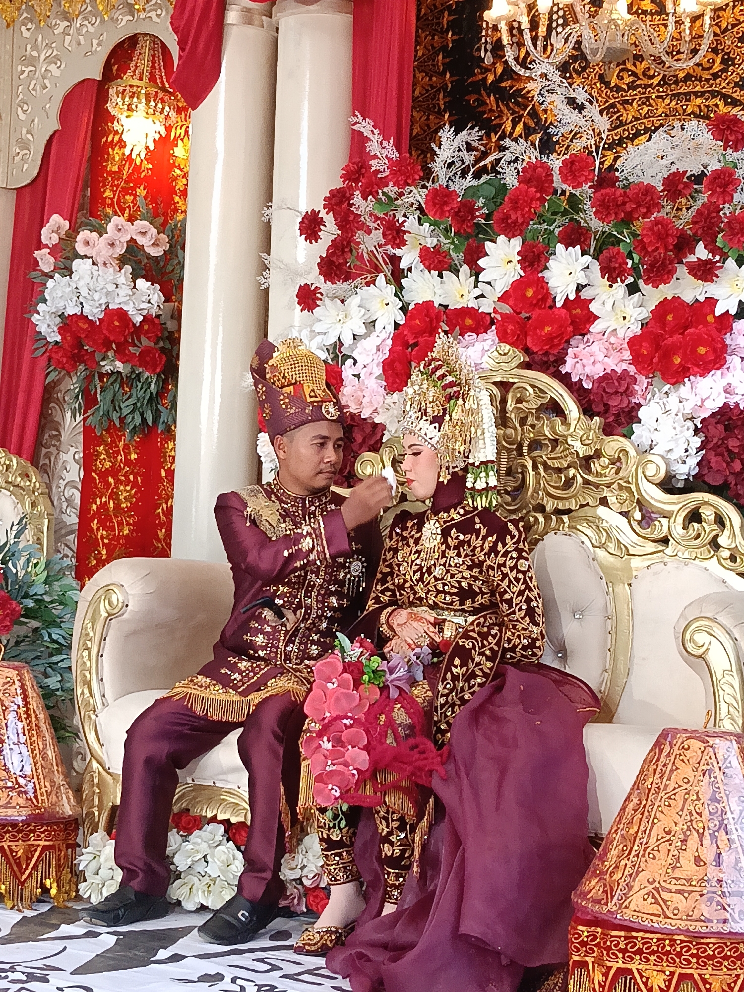 Traditional wedding ceremony underway in Geulumpangsulu Timu, Indonesia