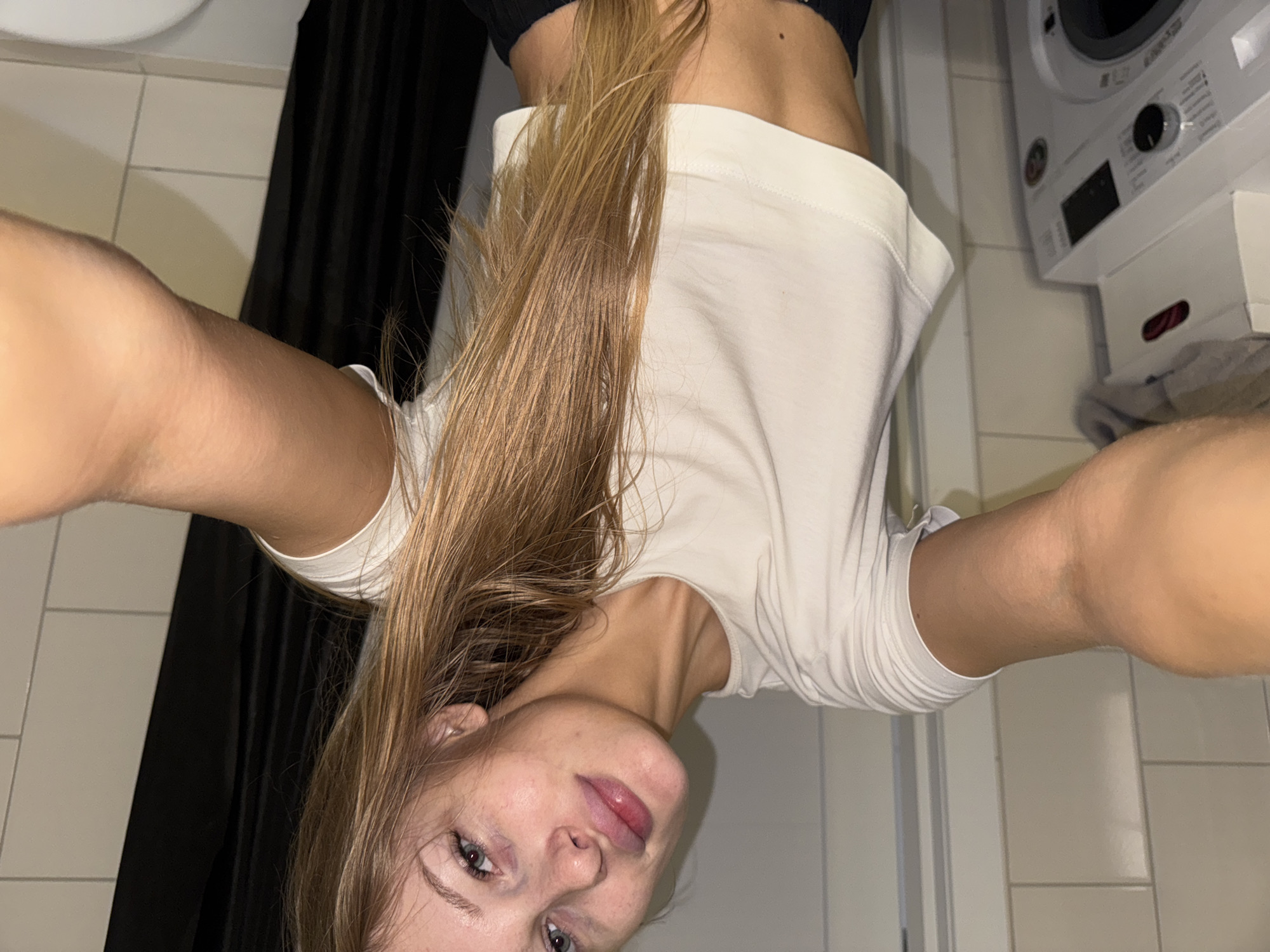 Bathroom mirror selfie session in Perm apartment