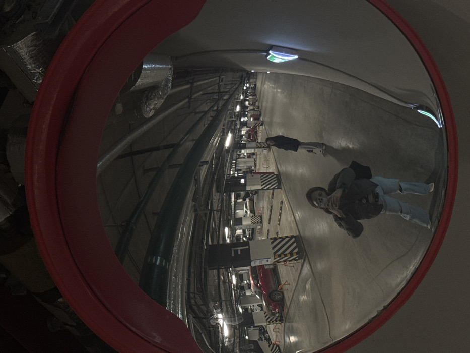 Underground parking garage reflected in fisheye mirror in Moscow
