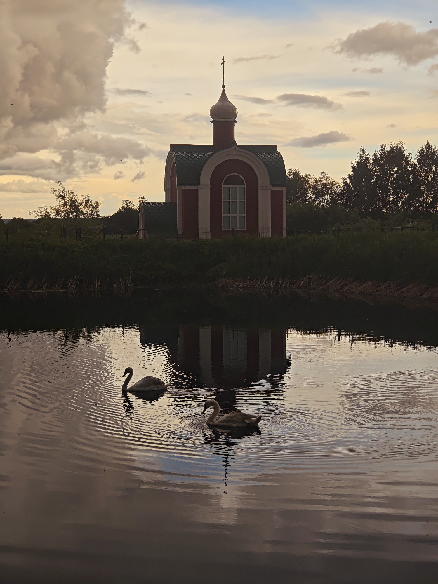 Visitor documents monastery complex and farm animals in Луговой, Russia