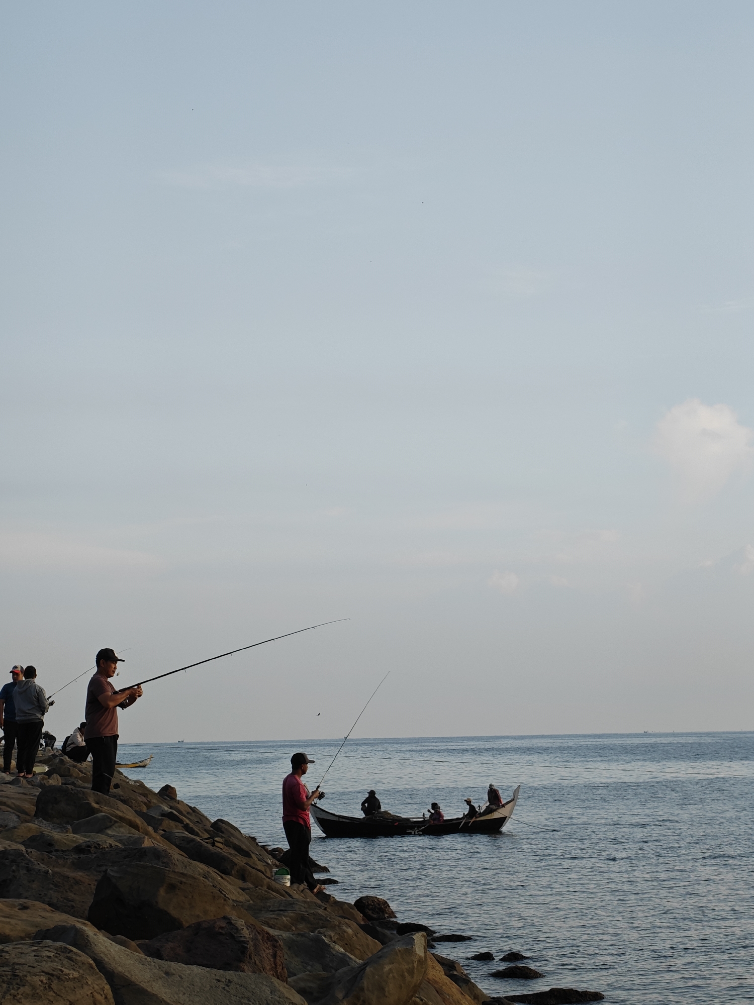 Nighttime fishing activity observed along Lhokseumawe rocky coastline