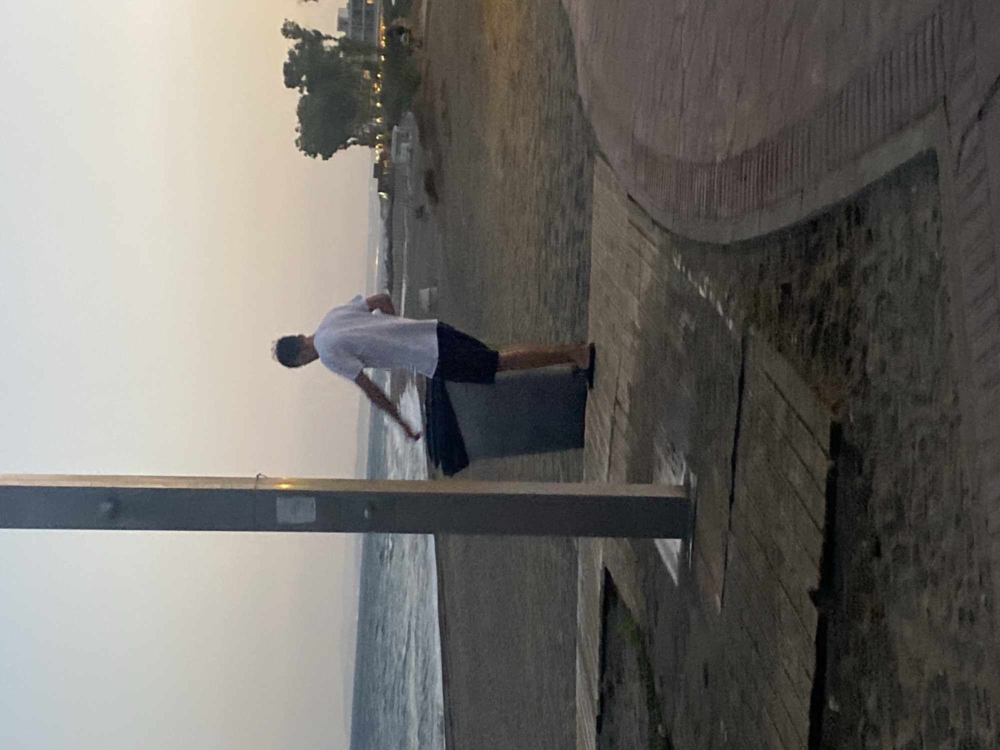 Evening activity along the Estepona coastal promenade at dusk